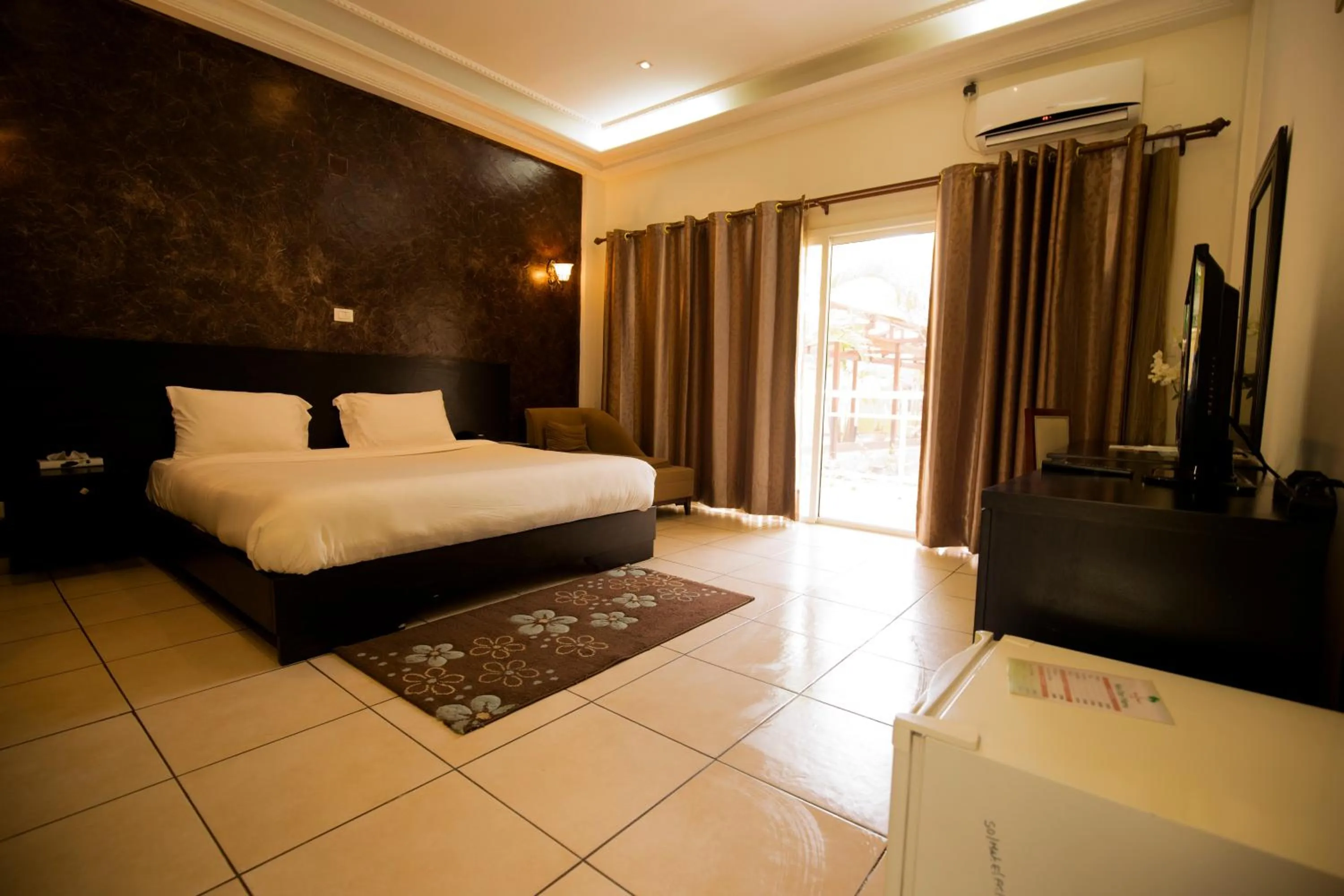 Bed in Hotel Palm Beach