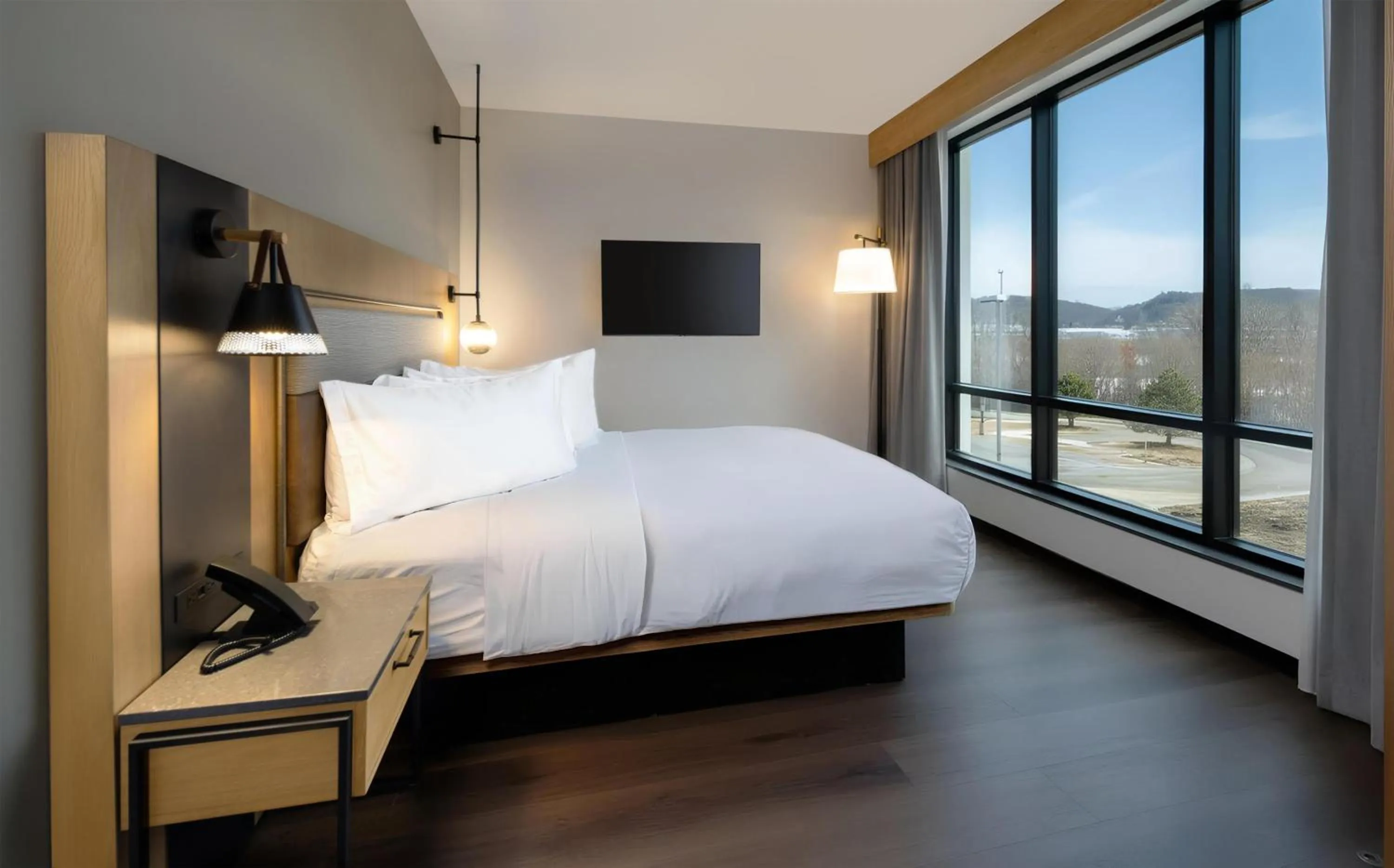 Bed in The Key Hotel Dubuque, Tapestry Collection By Hilton