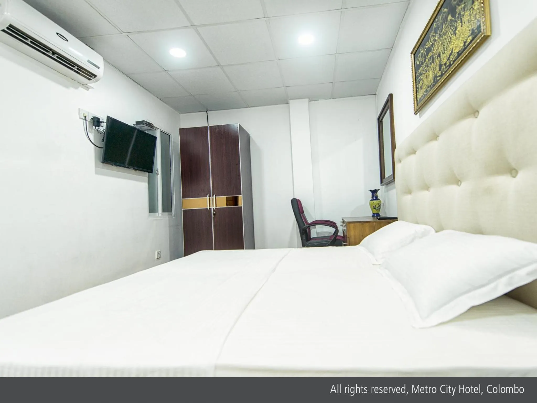 Bed in Metro City Hotel