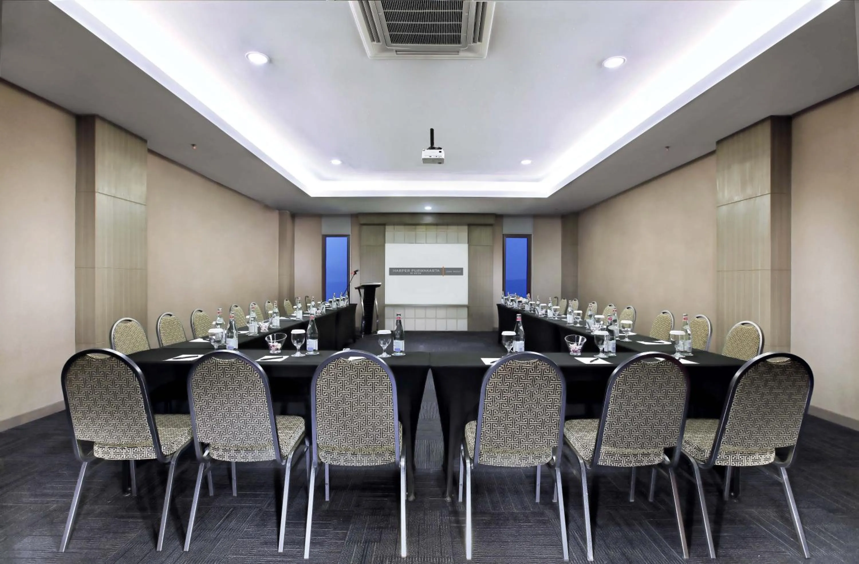 Meeting/conference room in Harper Purwakarta by ASTON