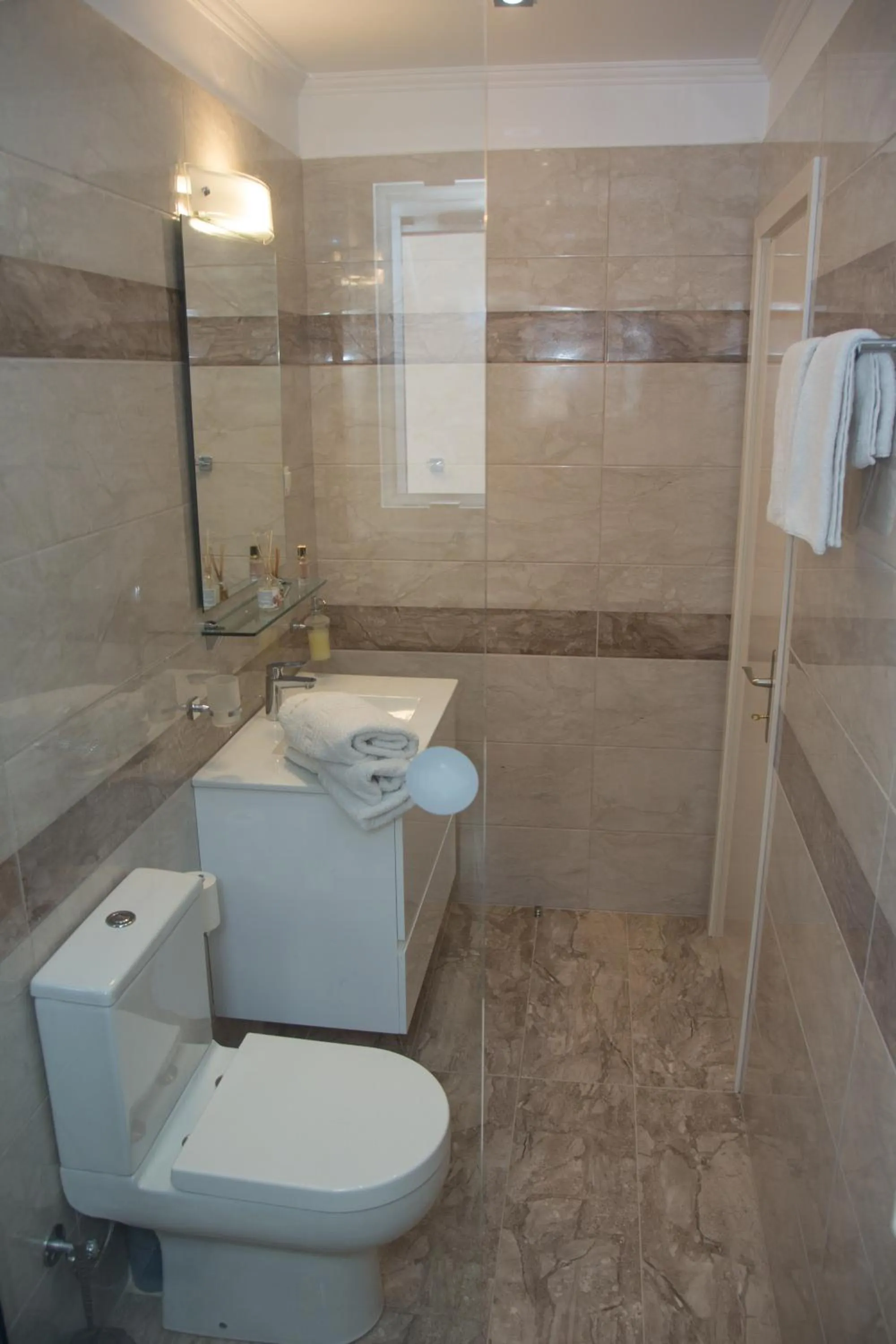 Bathroom in Brentanos Apartments - A - View of Paradise