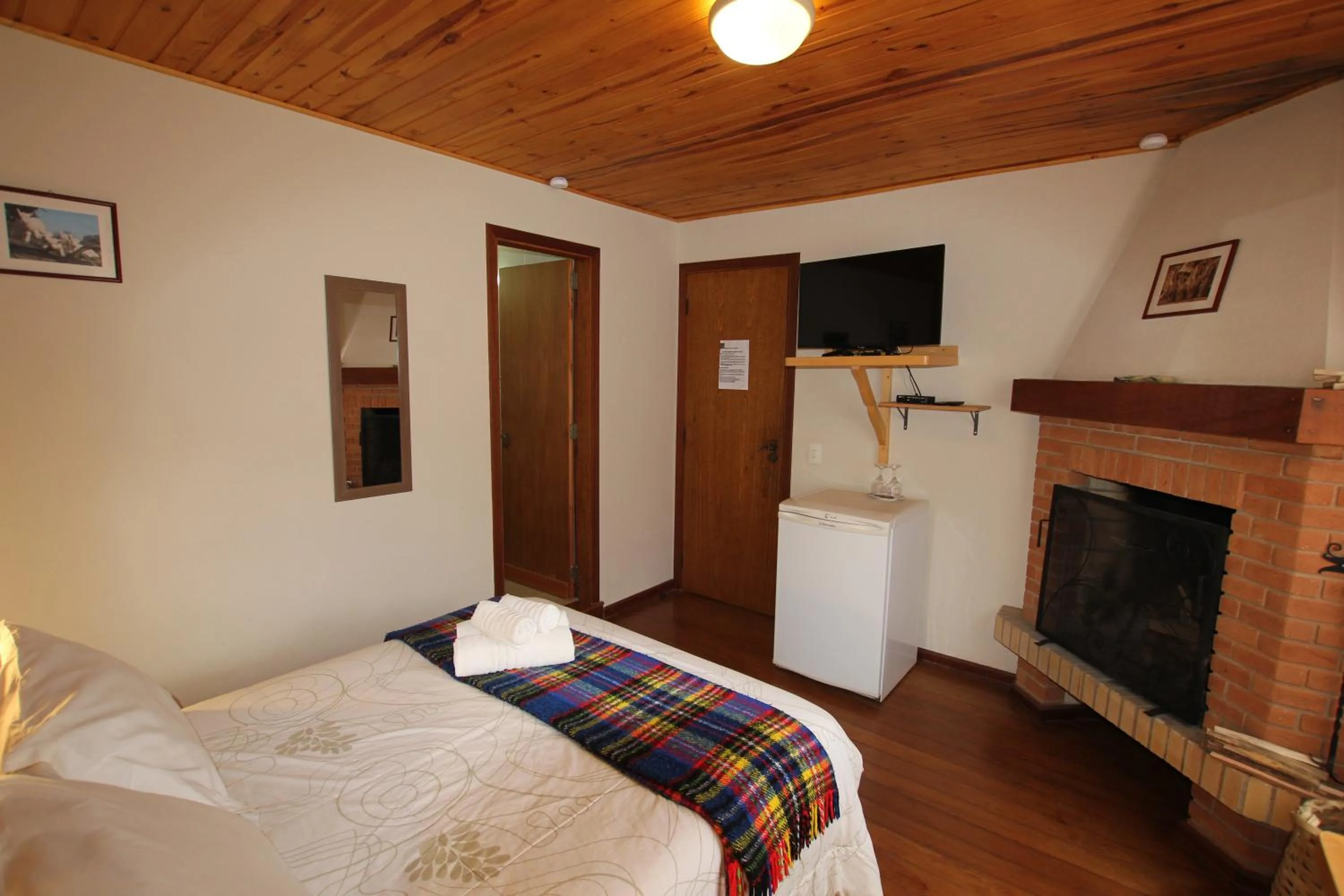 Bed in Pousada Aguia da Montanha