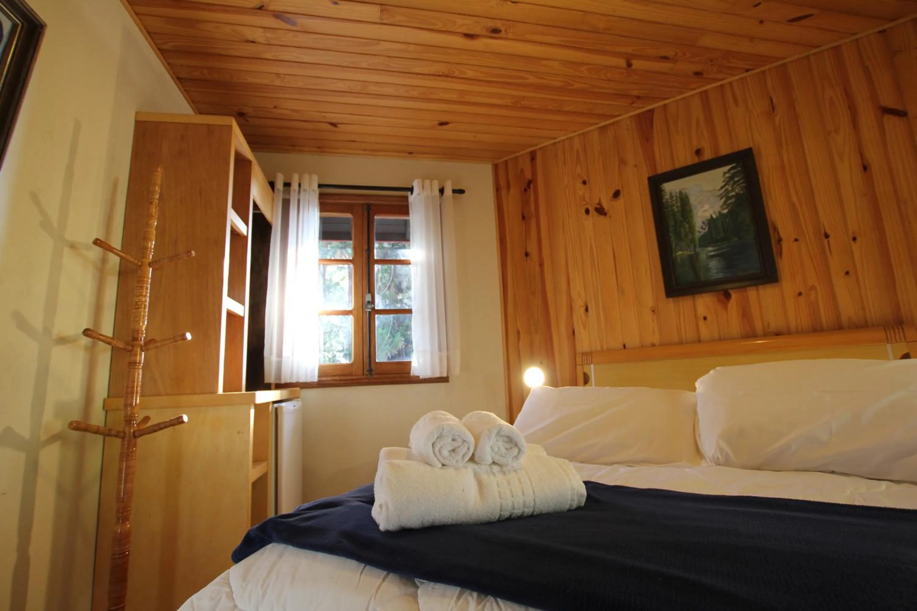 Bed in Pousada Aguia da Montanha