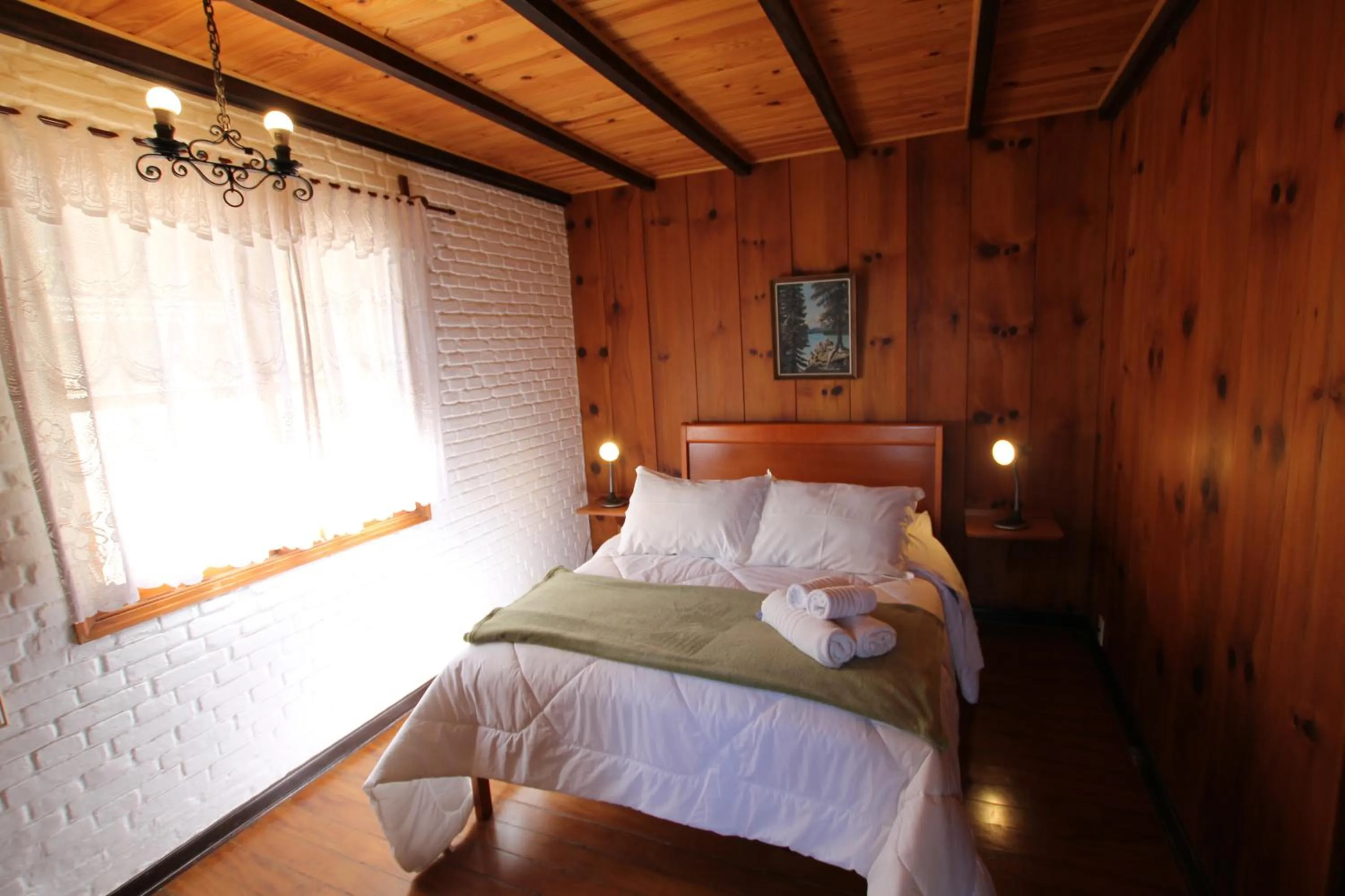 Bed in Pousada Aguia da Montanha