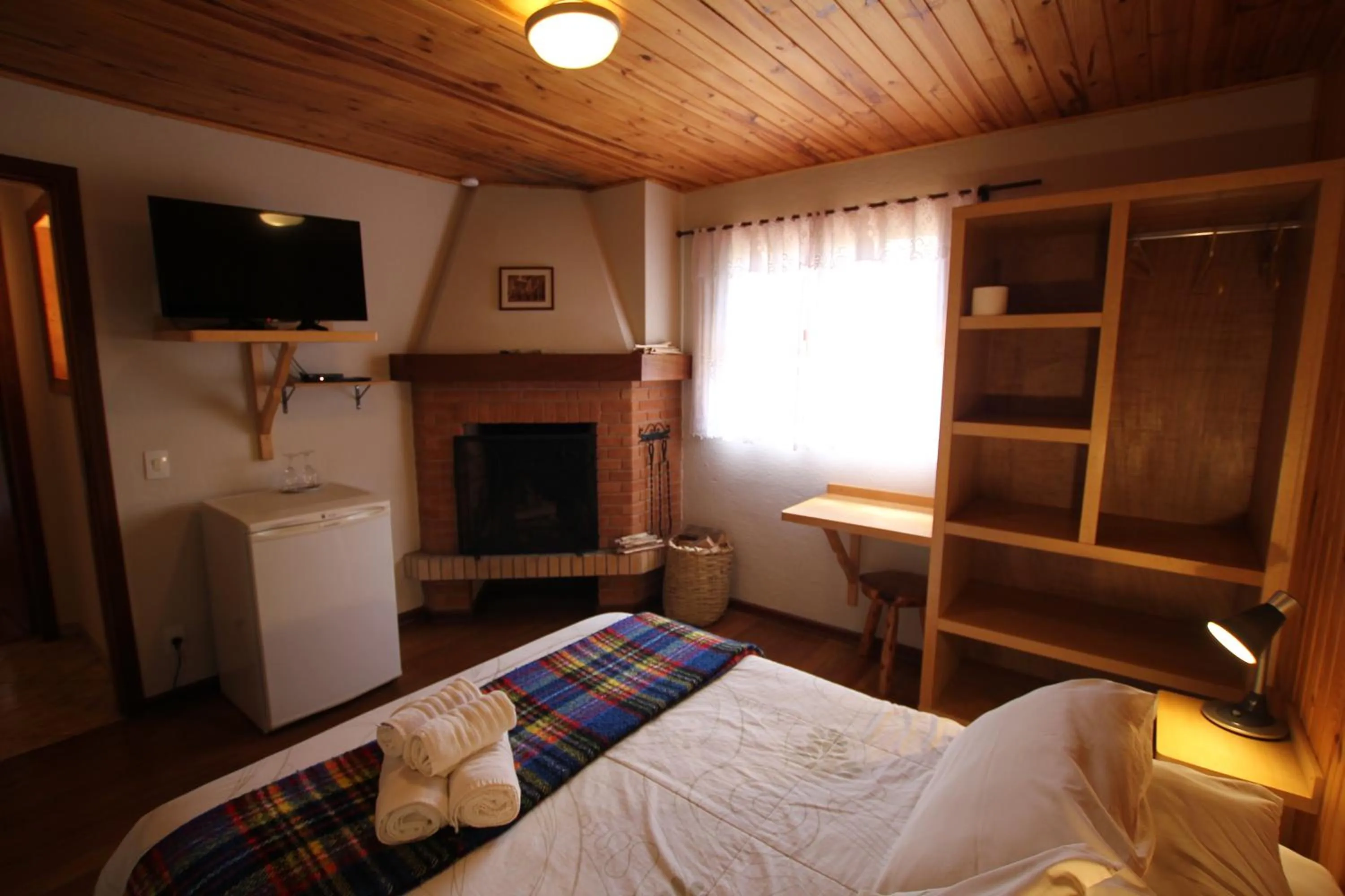 Bed in Pousada Aguia da Montanha