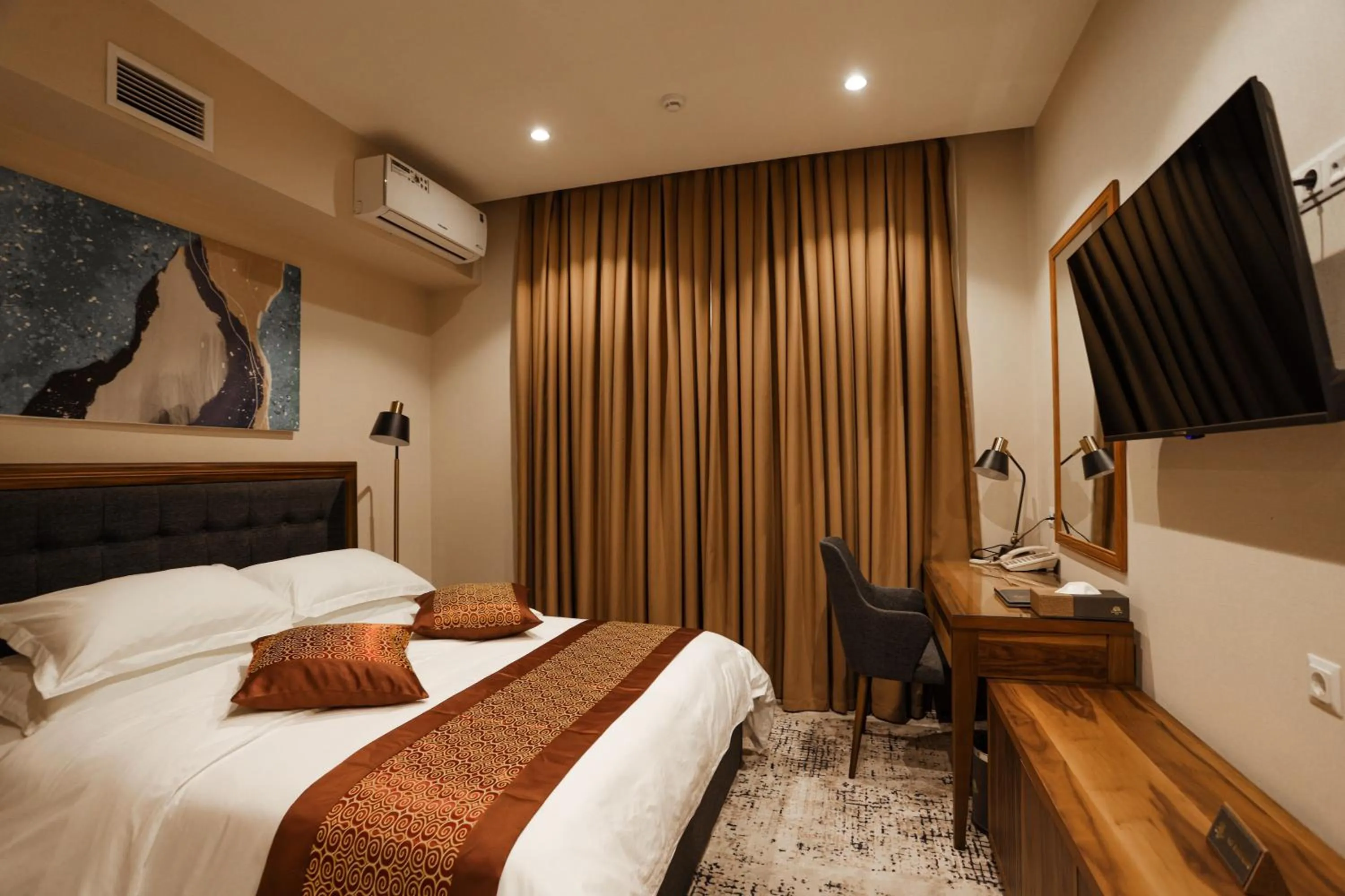 Bed in Bogishamol Hotel