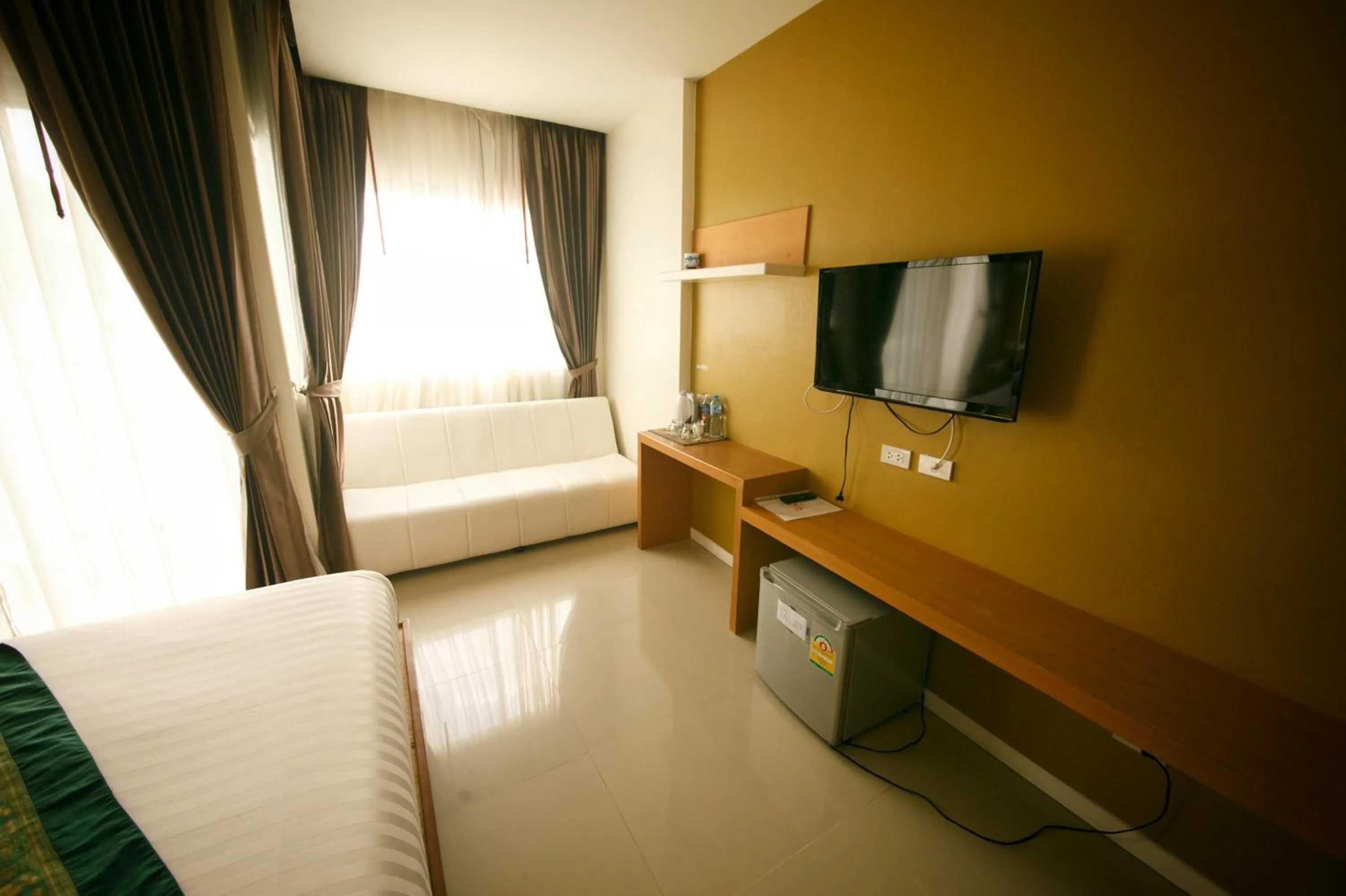 TV/Entertainment Center in Tropical Sunset Hotel Patong