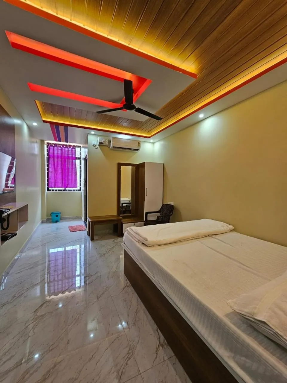 Bed in Ashwini Hotel And Lodging