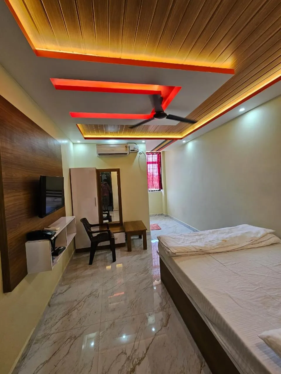 Bed in Ashwini Hotel And Lodging