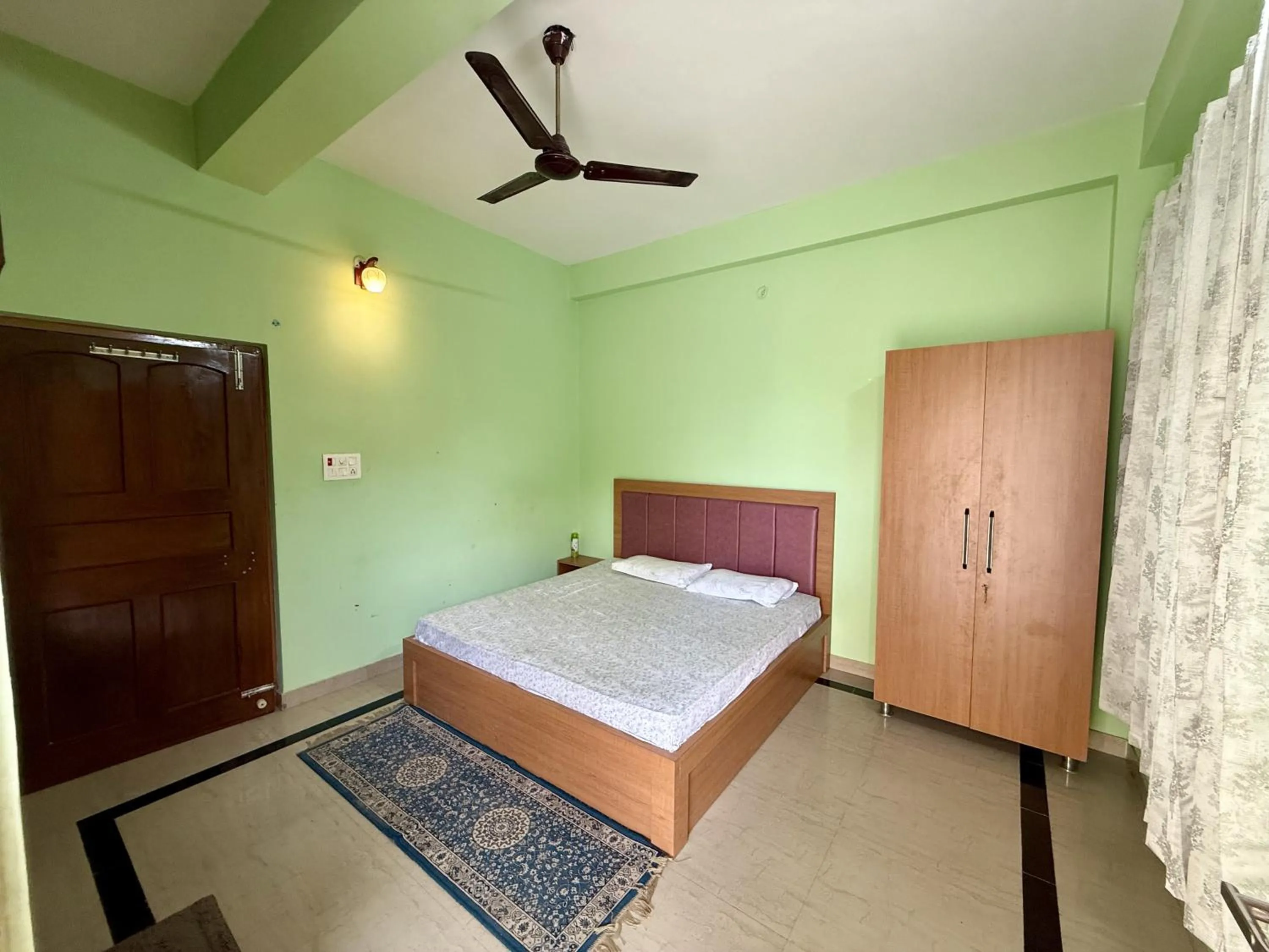 Bed in Madhuraj Villa Homestay