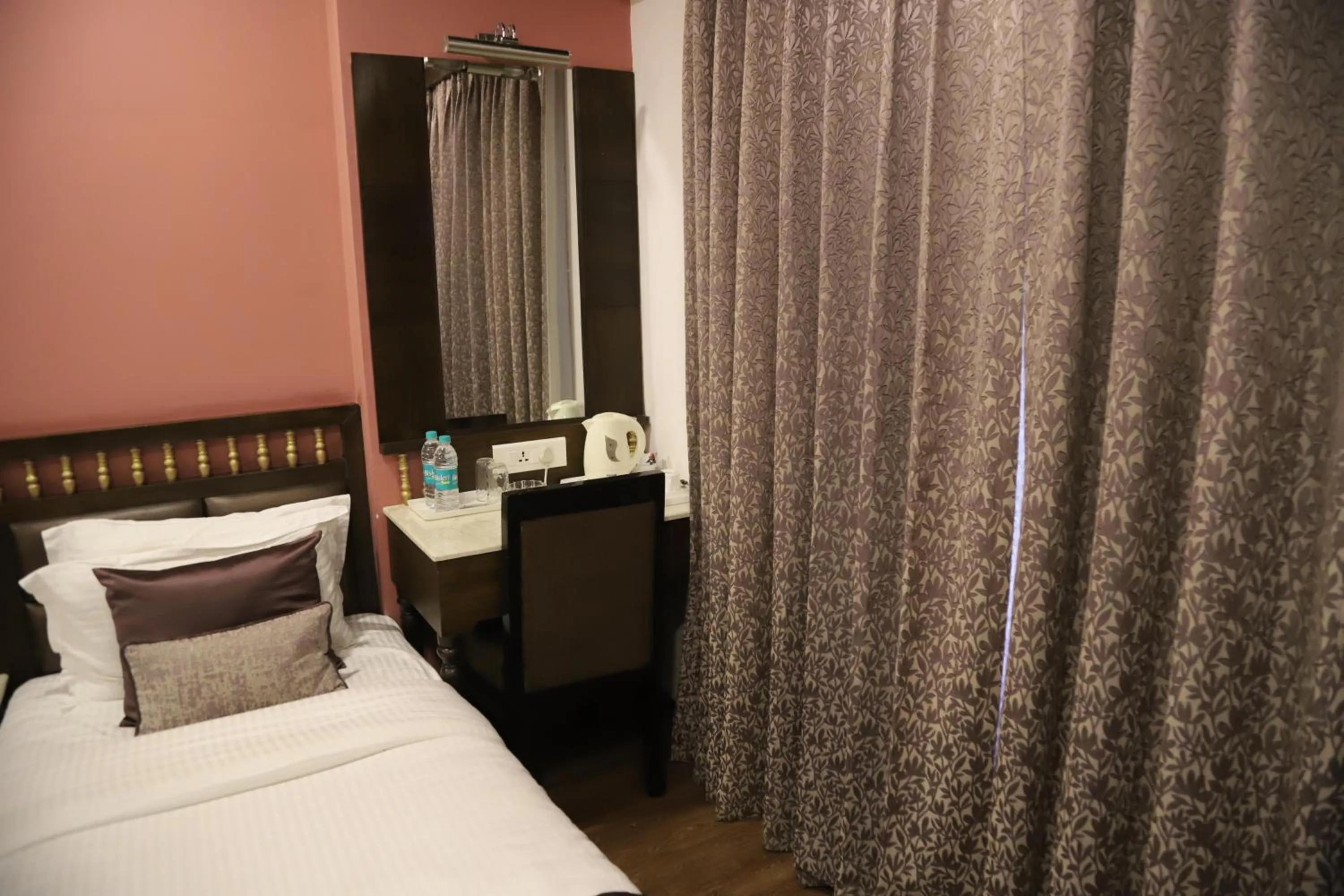 Bedroom in The Gandhi International