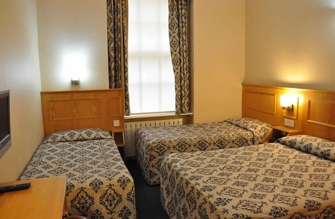 Photo of the whole room, Bed in Olympic House Hotel