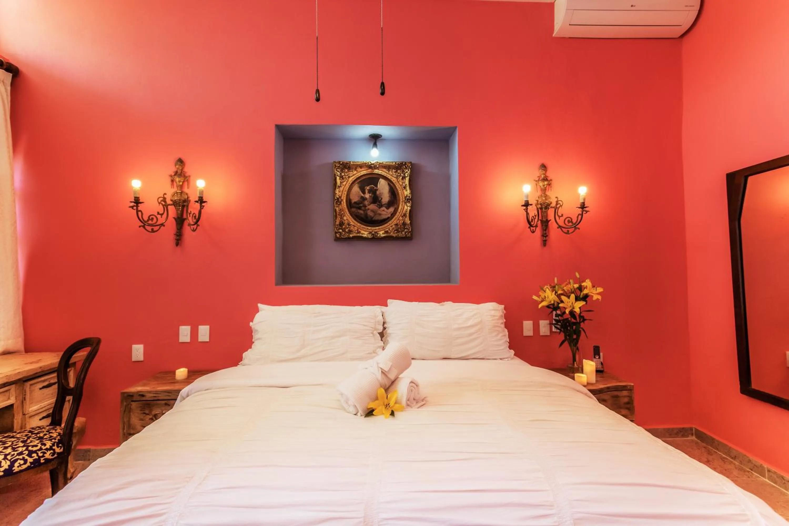 Bed in Garlands Del Rio Riverside Boutique Hotel