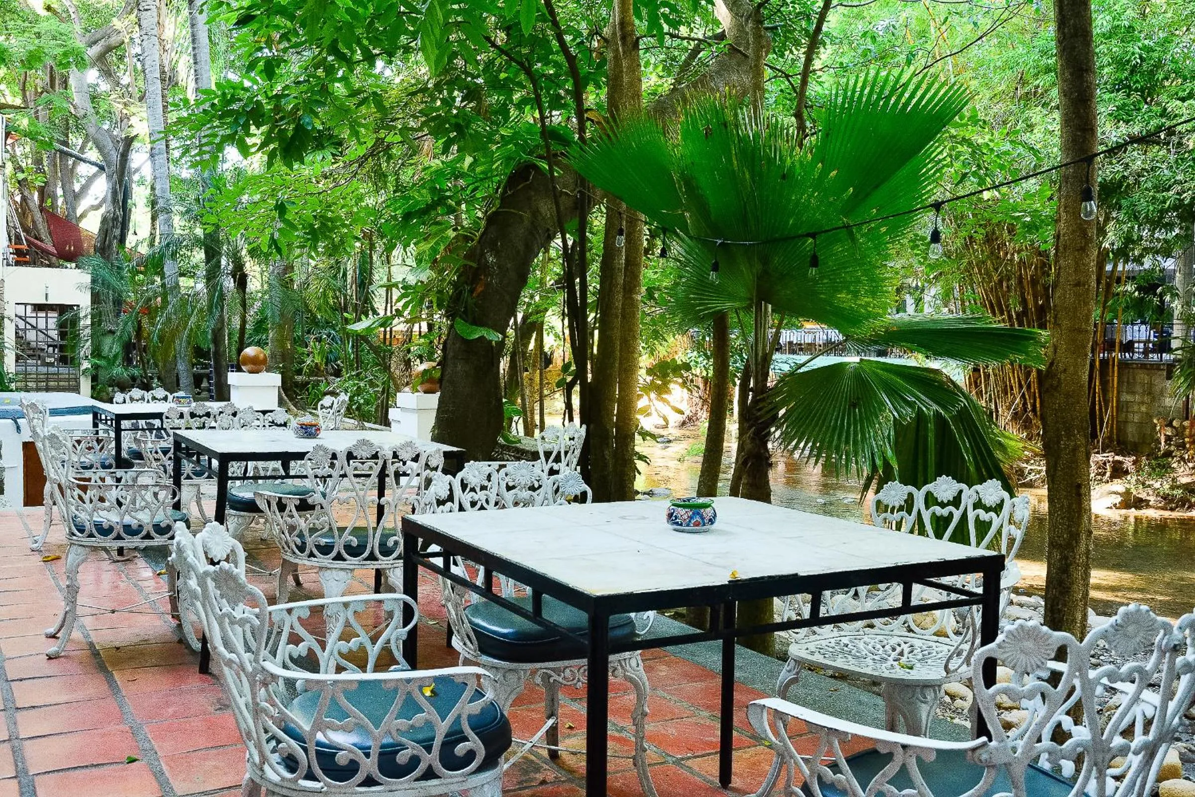 Patio in Garlands Del Rio Riverside Boutique Hotel