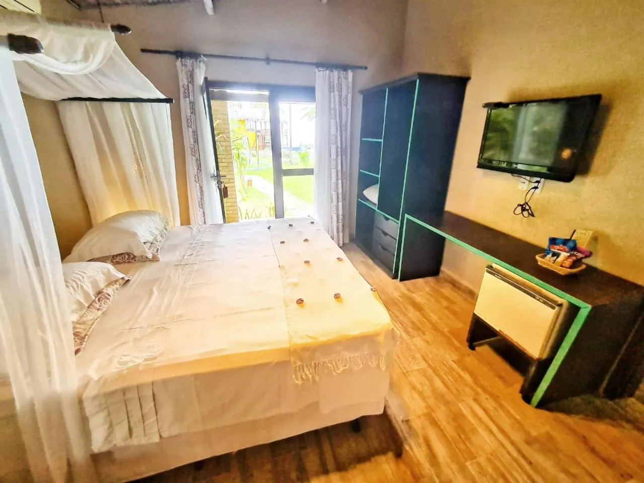 Photo of the whole room, Bed in Pousada Spa dos Amores