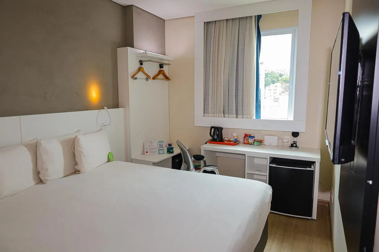 Bed in eSuites Virgínia Luxemburgo