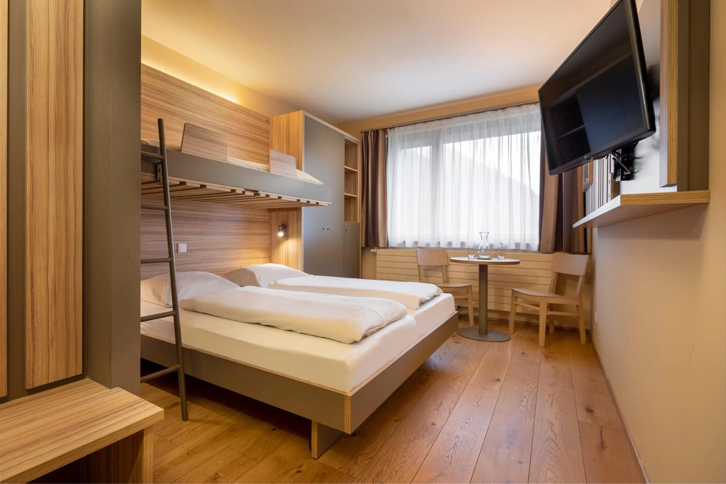 TV and multimedia, Bed in JUFA Hotel Malbun