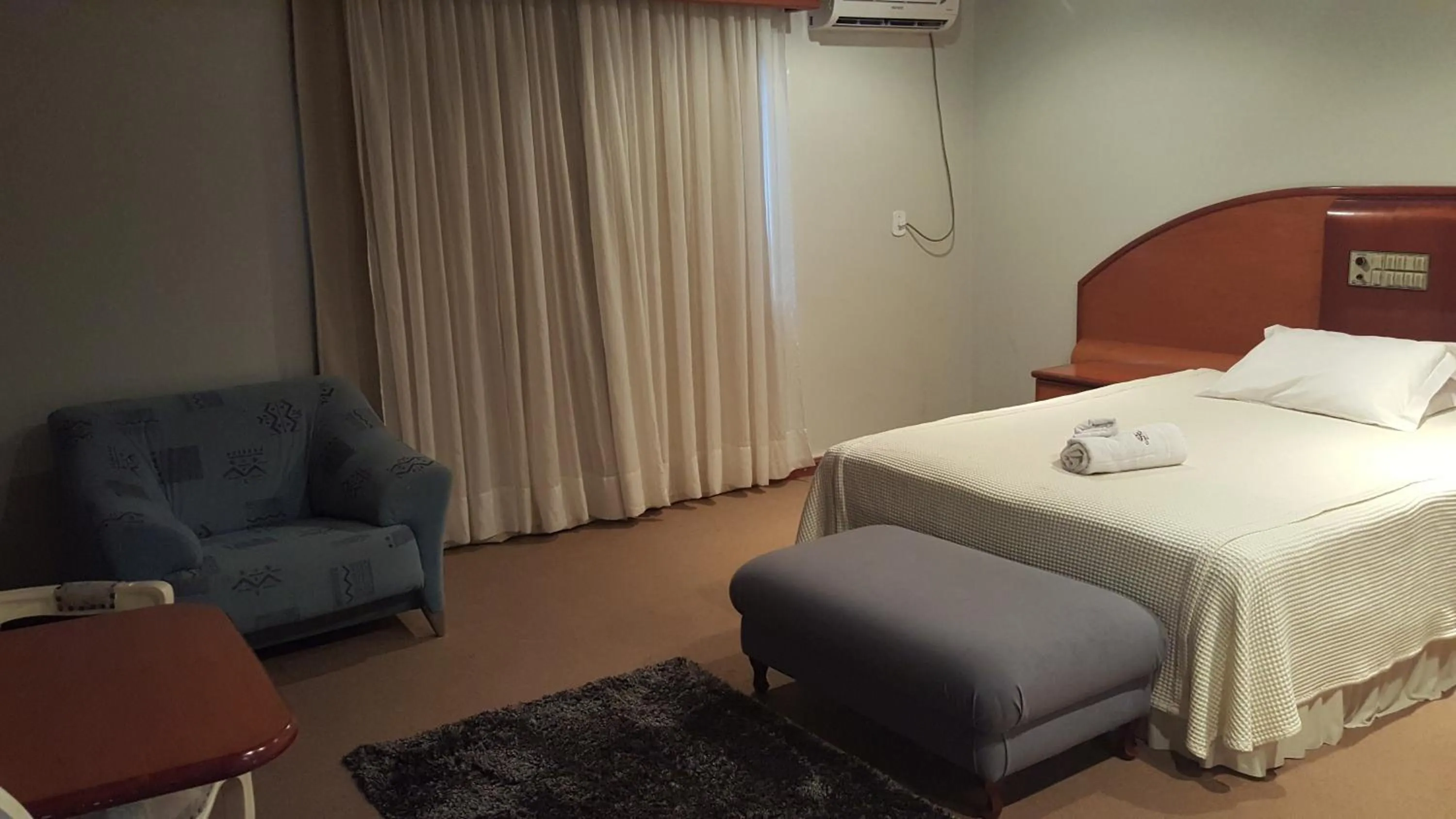 Bed in Cristal Executive Hotel