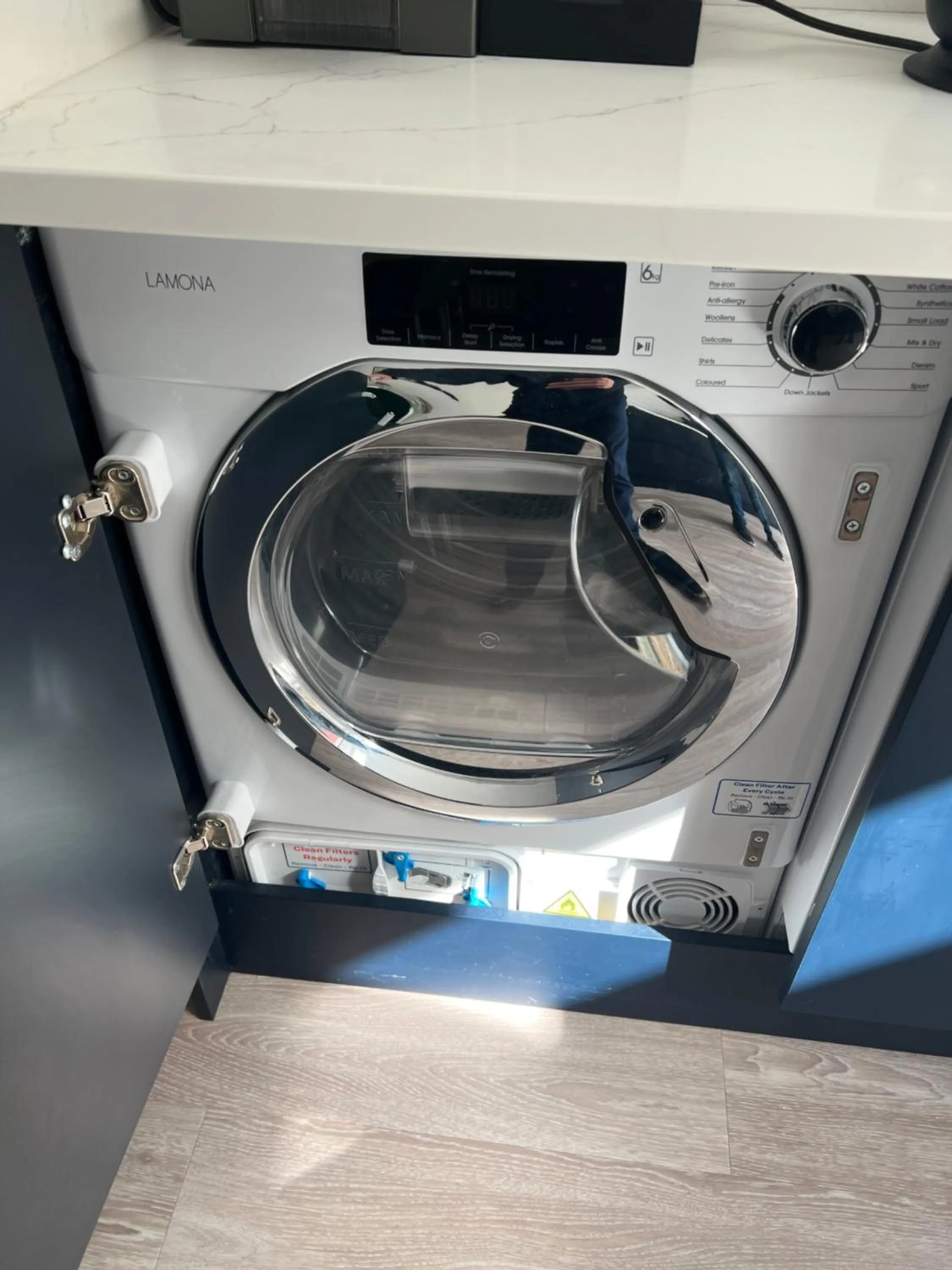 washing machine in Mode Apartments St Annes