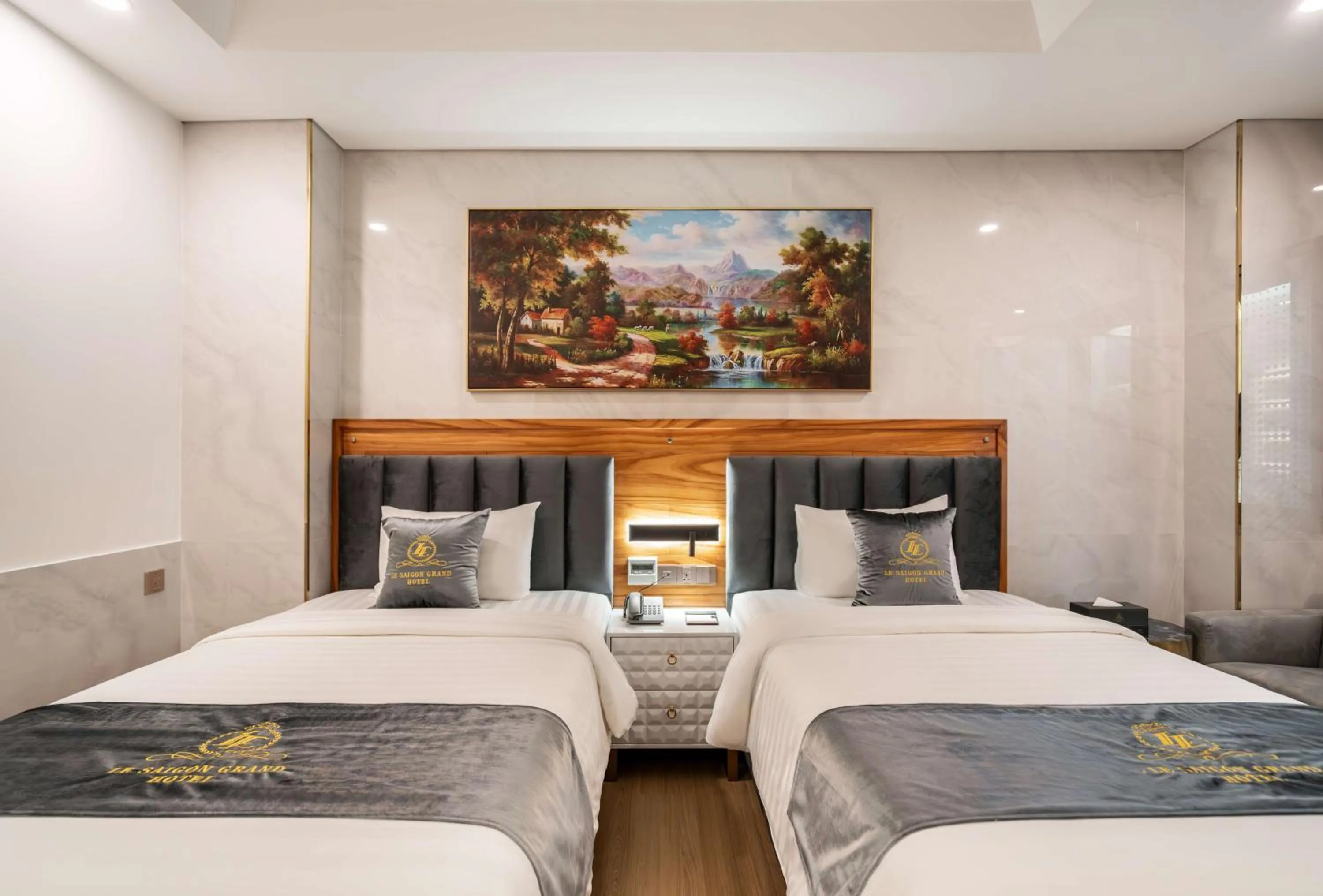 Bed in Le Saigon Grand Hotel