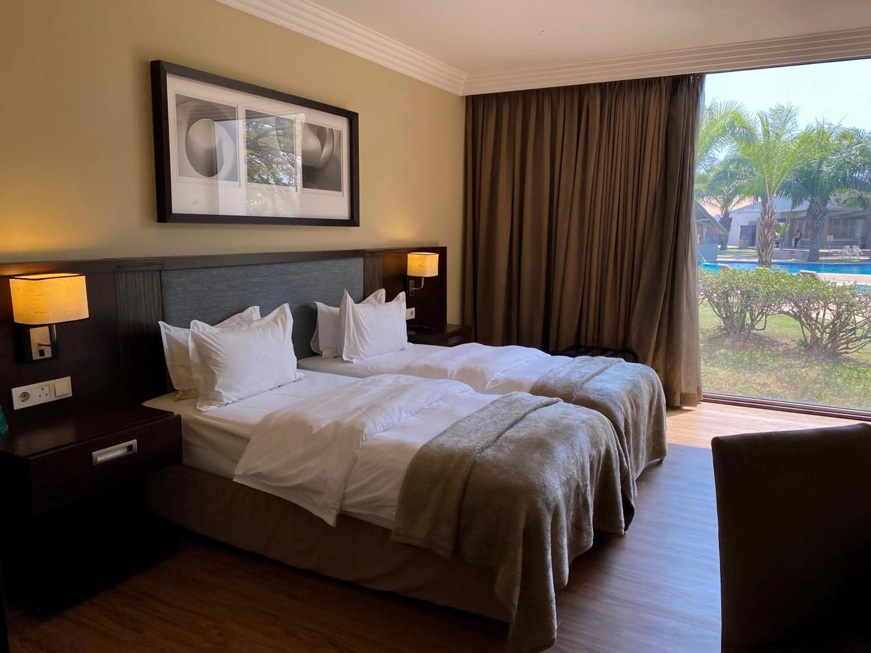 Property building, Bed in Pullman Lubumbashi Grand Karavia.