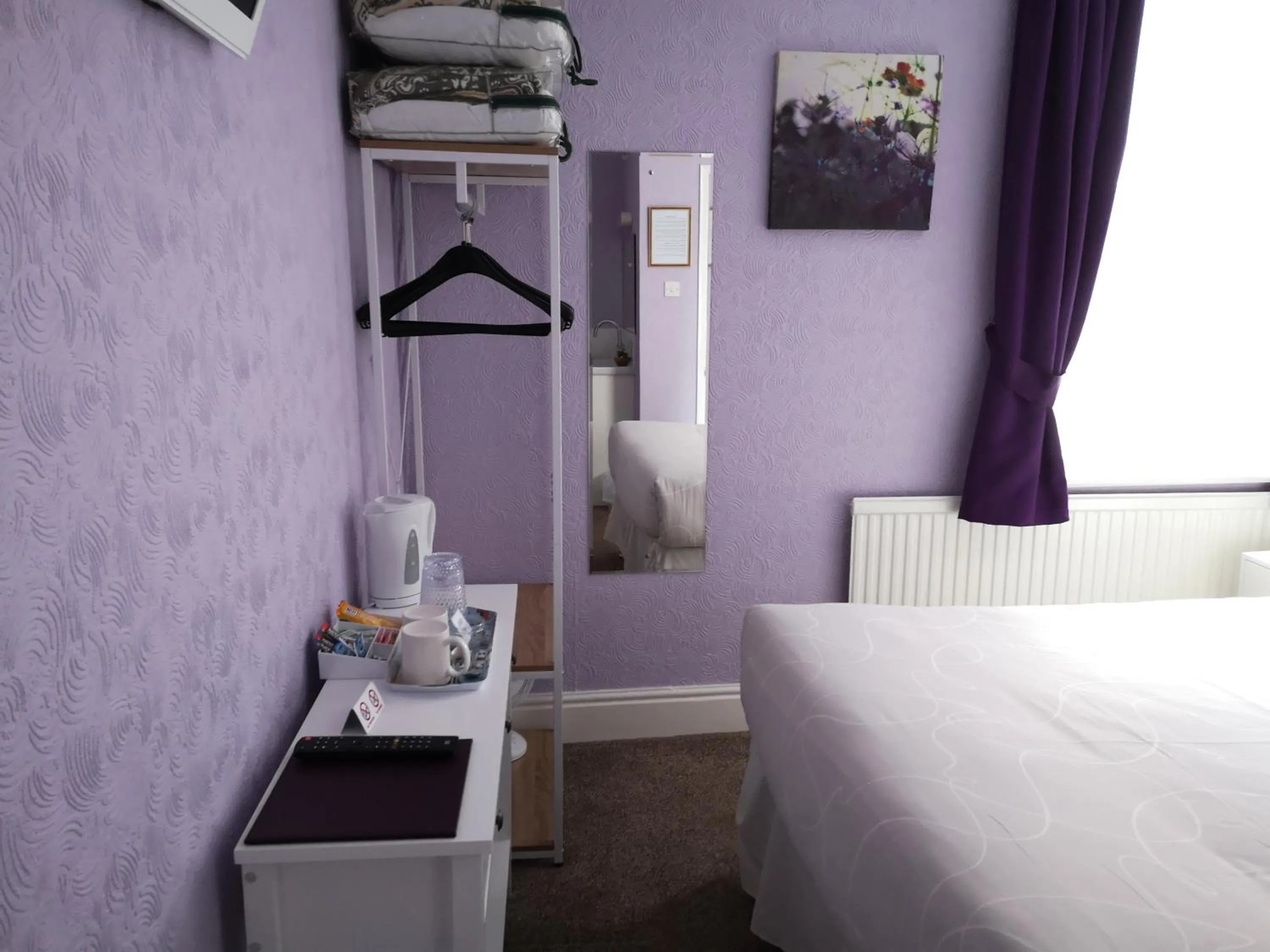 Bedroom in The Phoenix Guest House