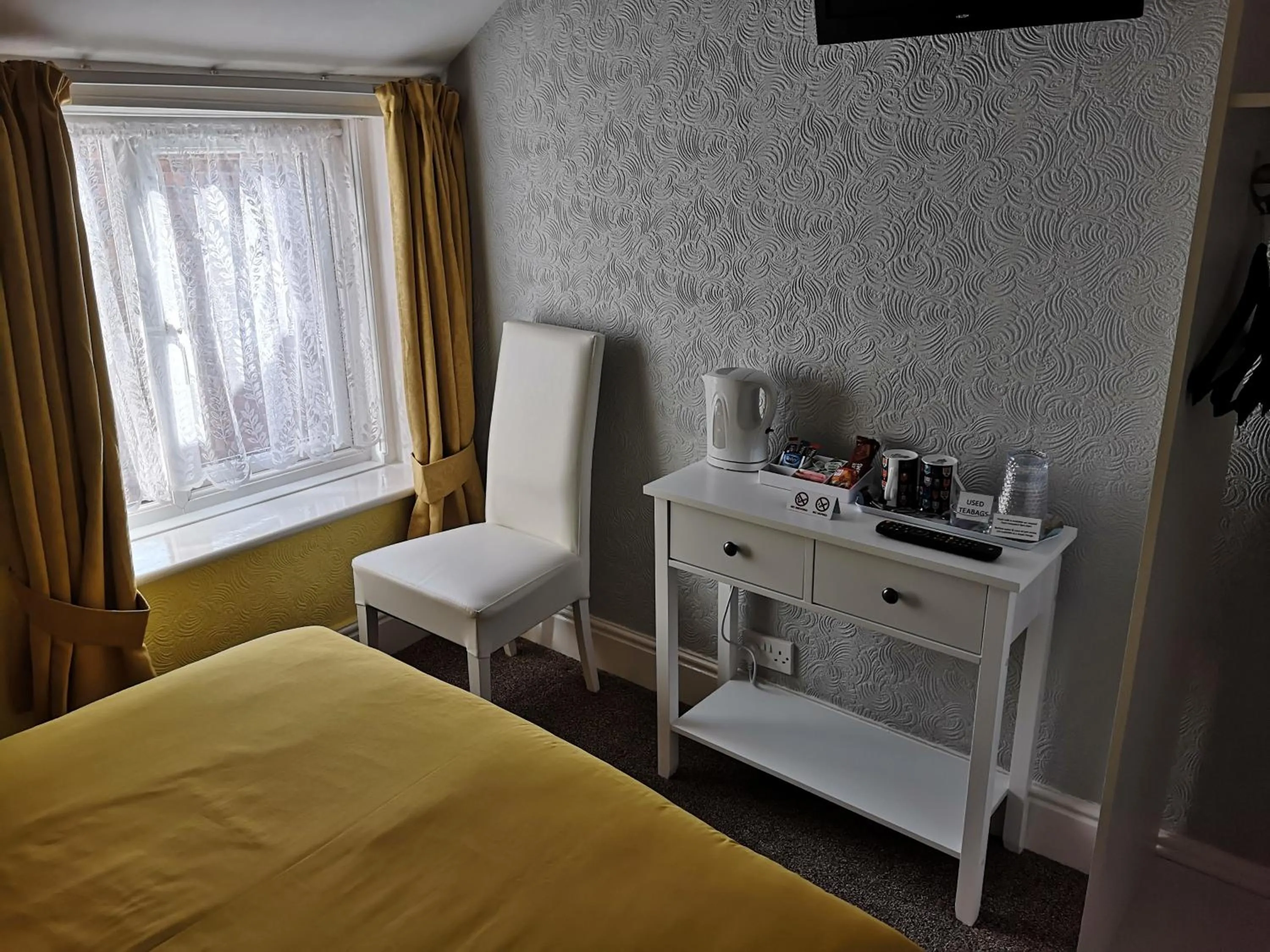 Bedroom in The Phoenix Guest House