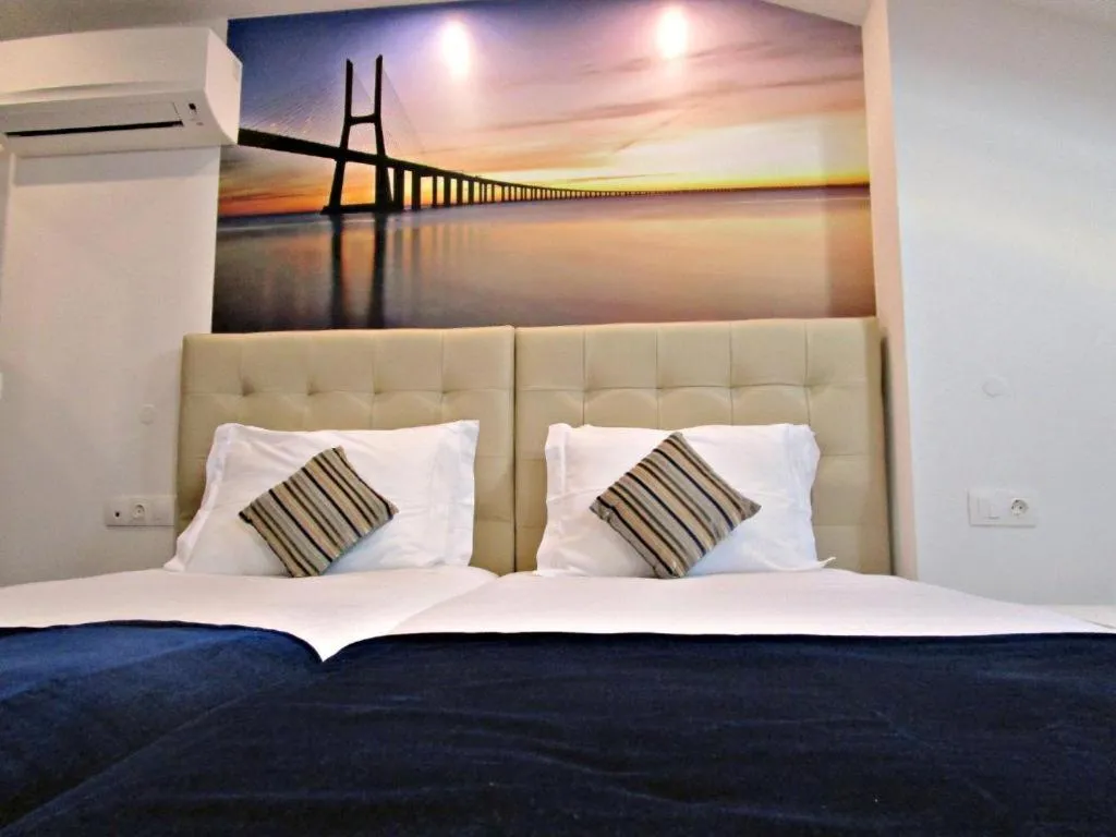 Bed in Lisbon City Apartments & Suites by City Hotels