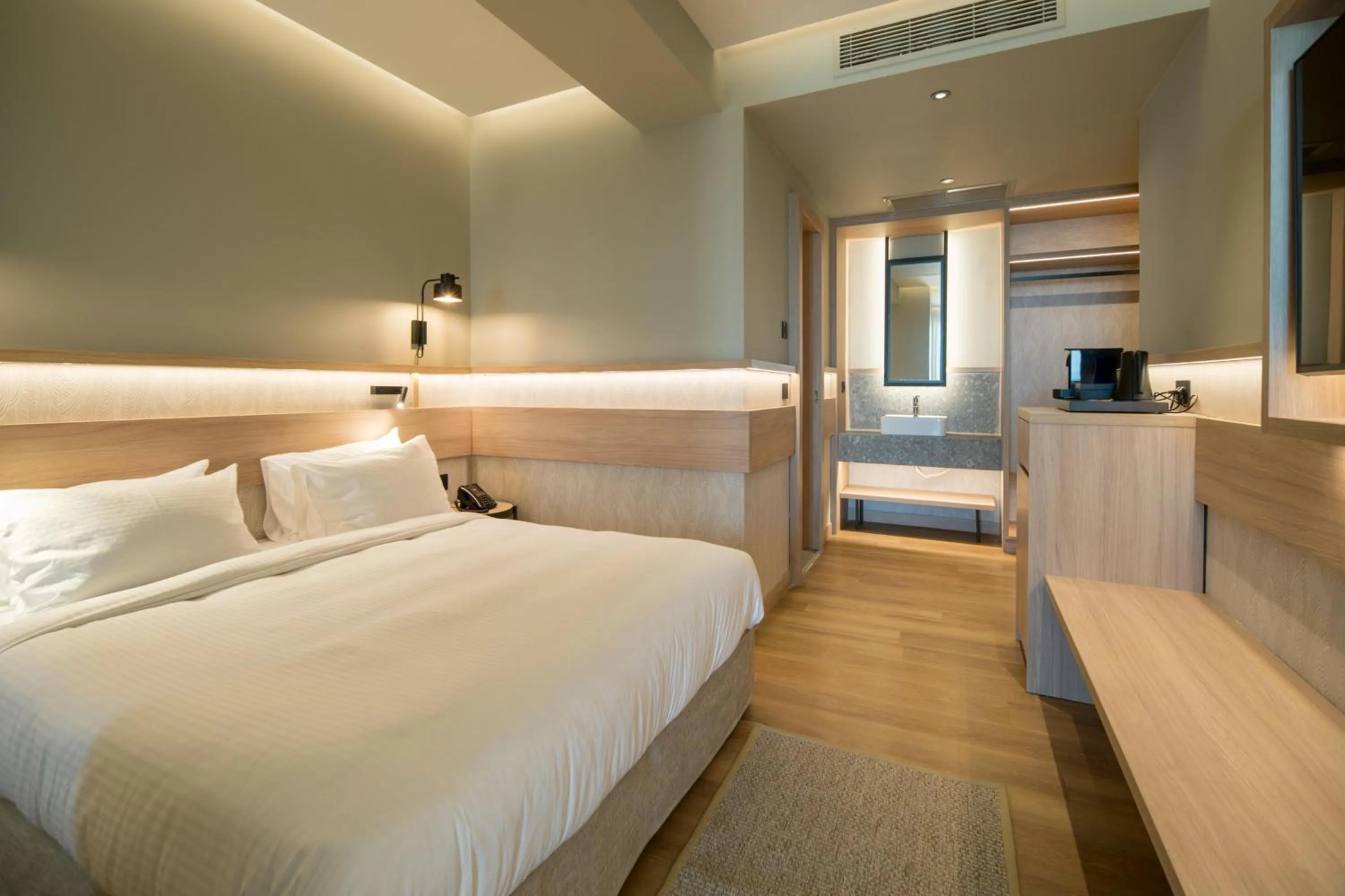 Photo of the whole room, Bed in SENSEANA Sea Side Resort & Aquadventure