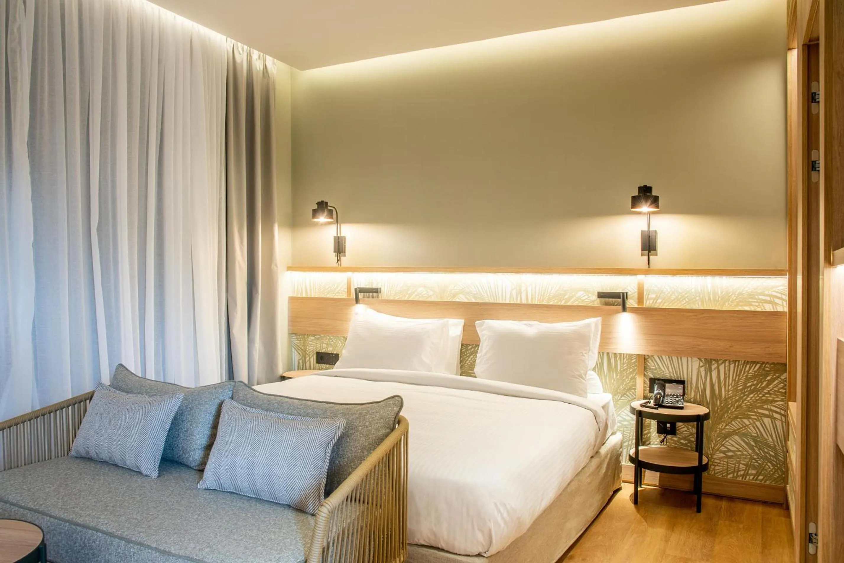 Photo of the whole room, Bed in SENSEANA Sea Side Resort & Aquadventure