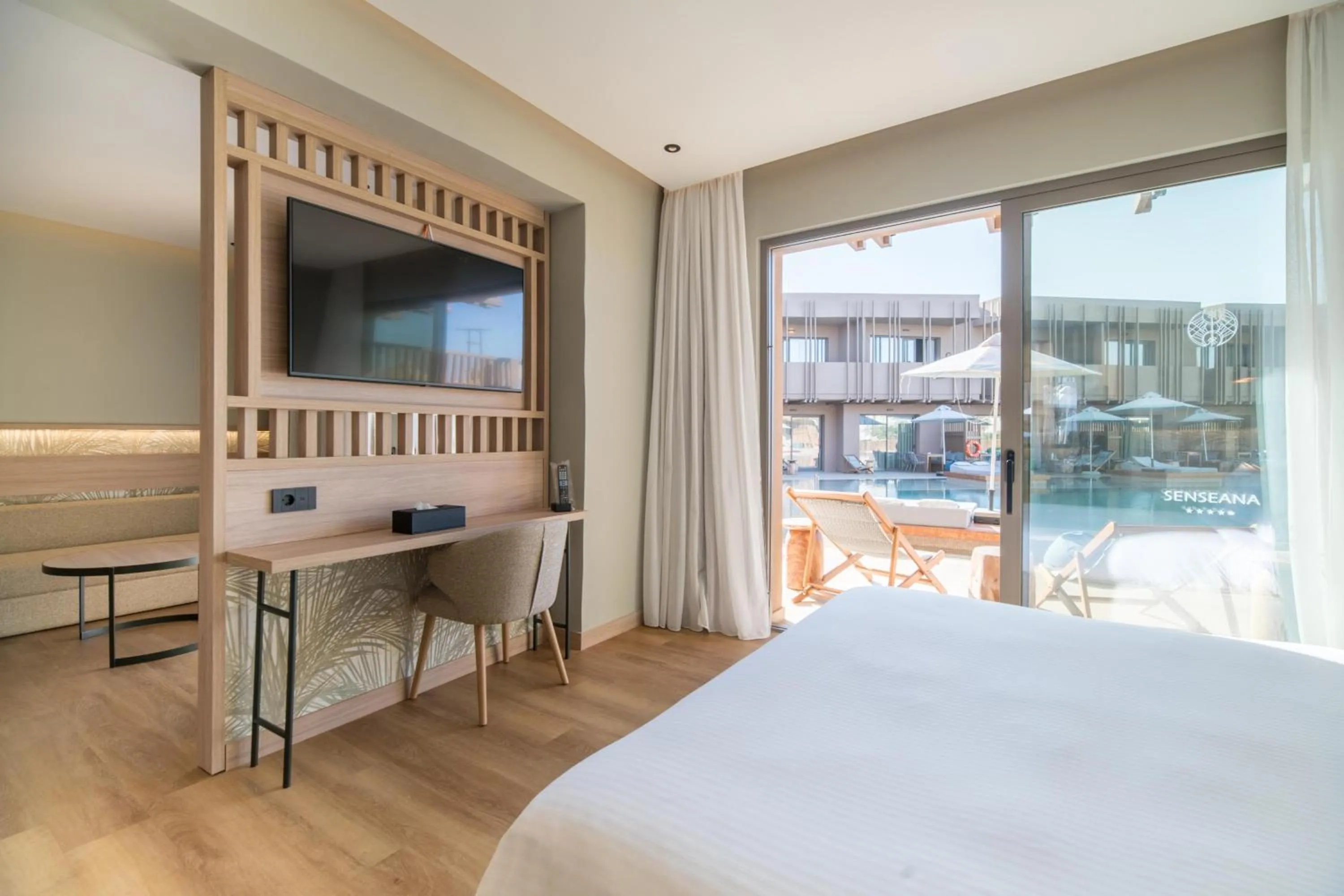 Photo of the whole room, Bed in SENSEANA Sea Side Resort & Aquadventure