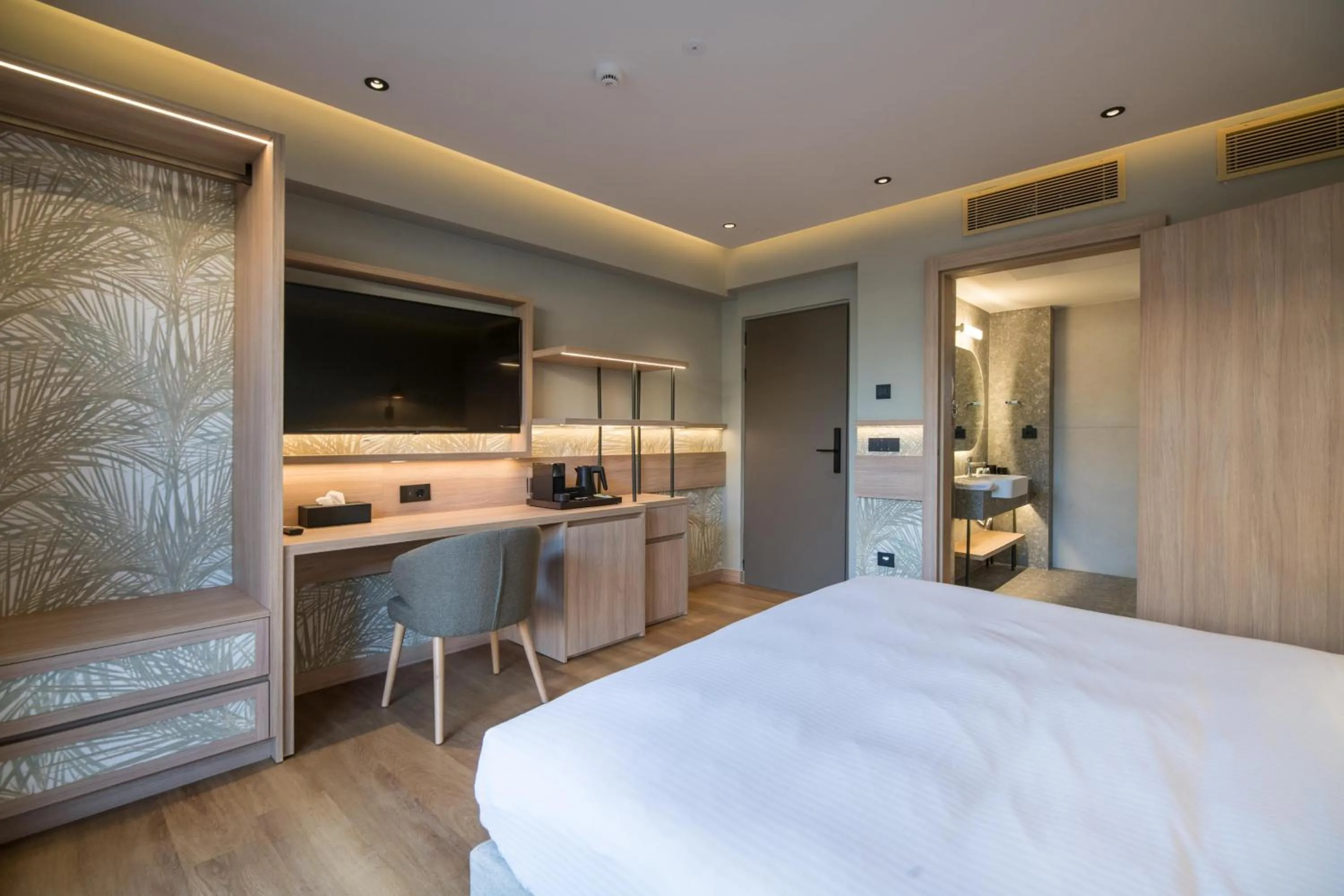 Photo of the whole room, Bed in SENSEANA Sea Side Resort & Aquadventure