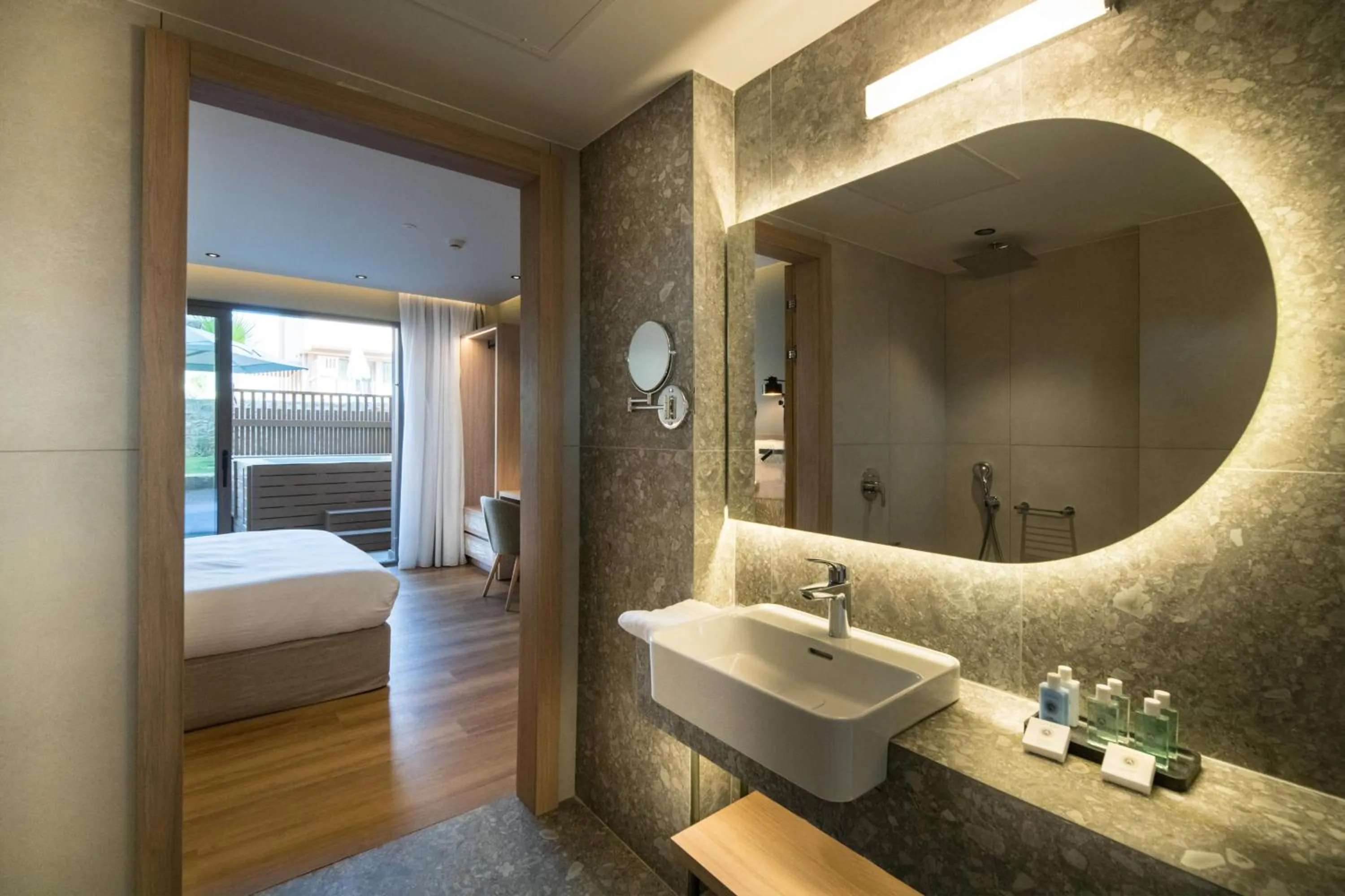 Bathroom, Bed in SENSEANA Sea Side Resort & Aquadventure