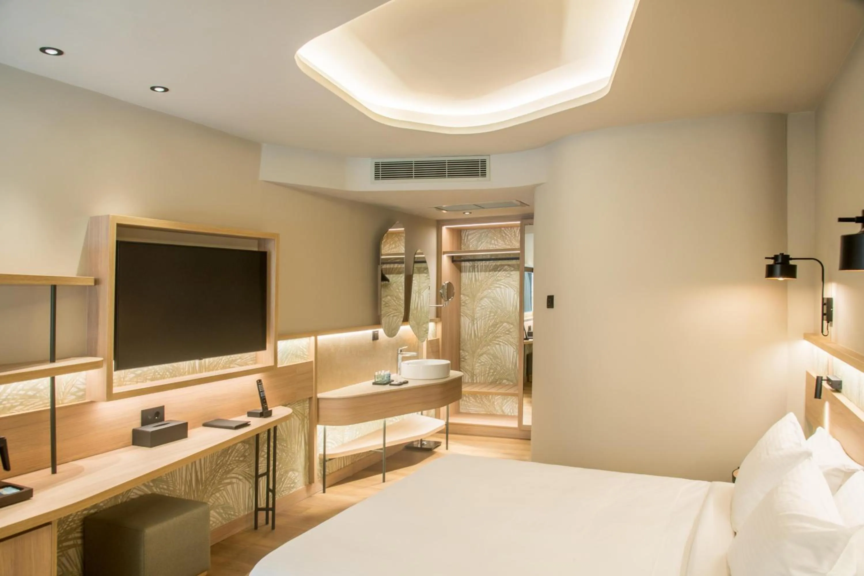 Photo of the whole room, Bed in SENSEANA Sea Side Resort & Aquadventure