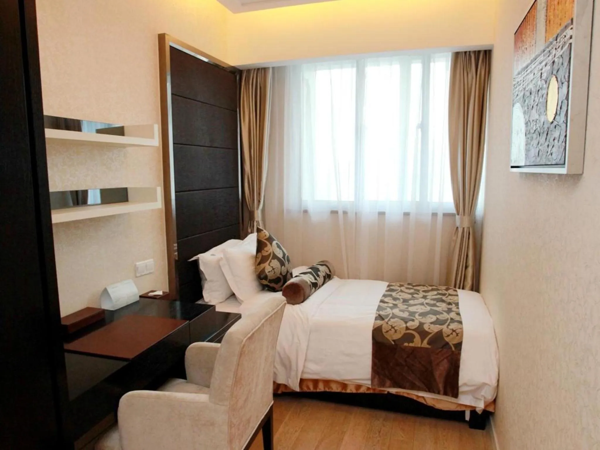 Bedroom in The Cumberland Boutique Hotel