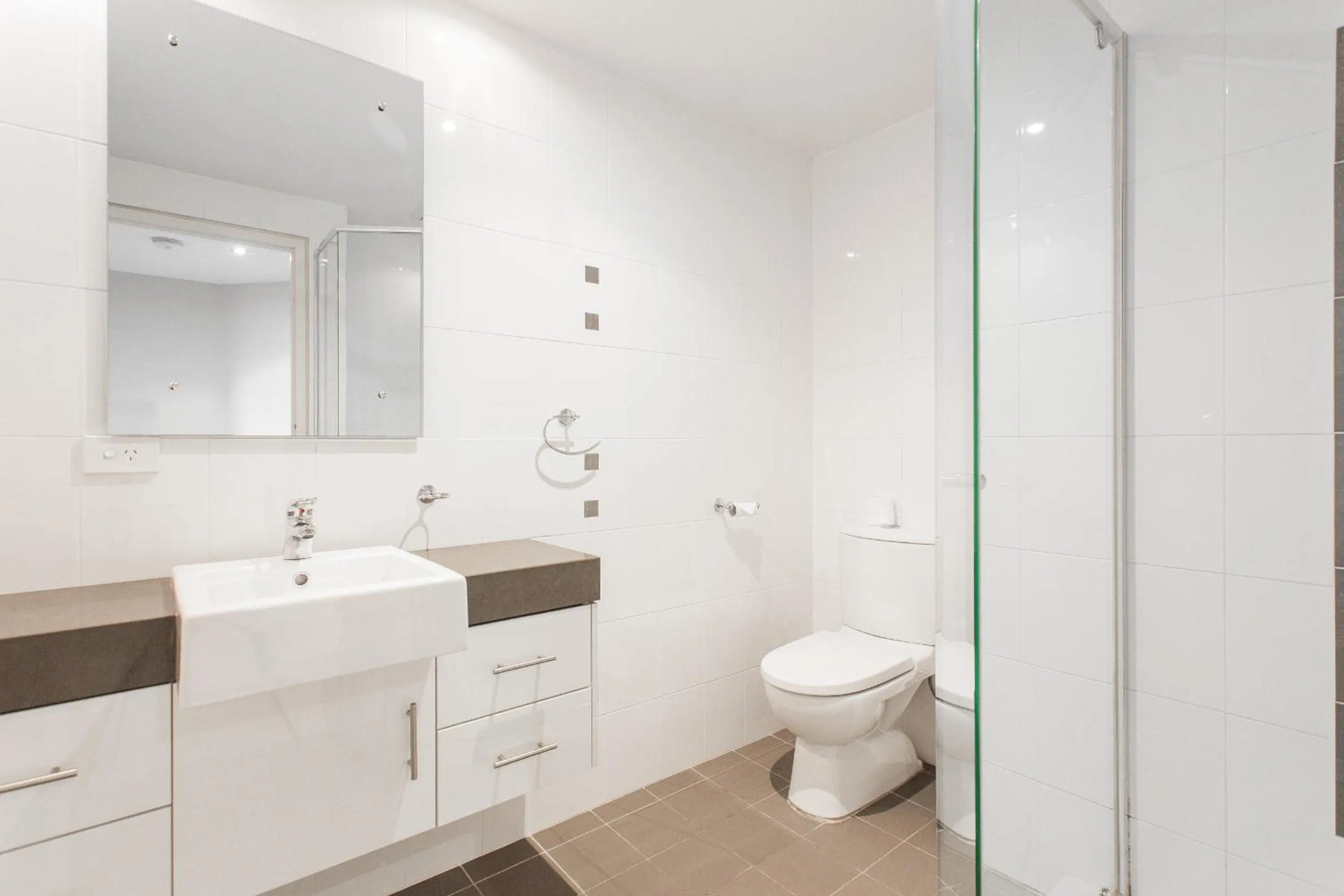 Bathroom in Spinnakers by Rockingham Apartments