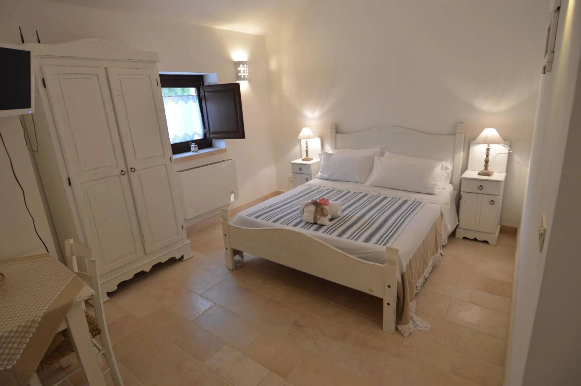 Bed in La Corticella Bed & Breakfast