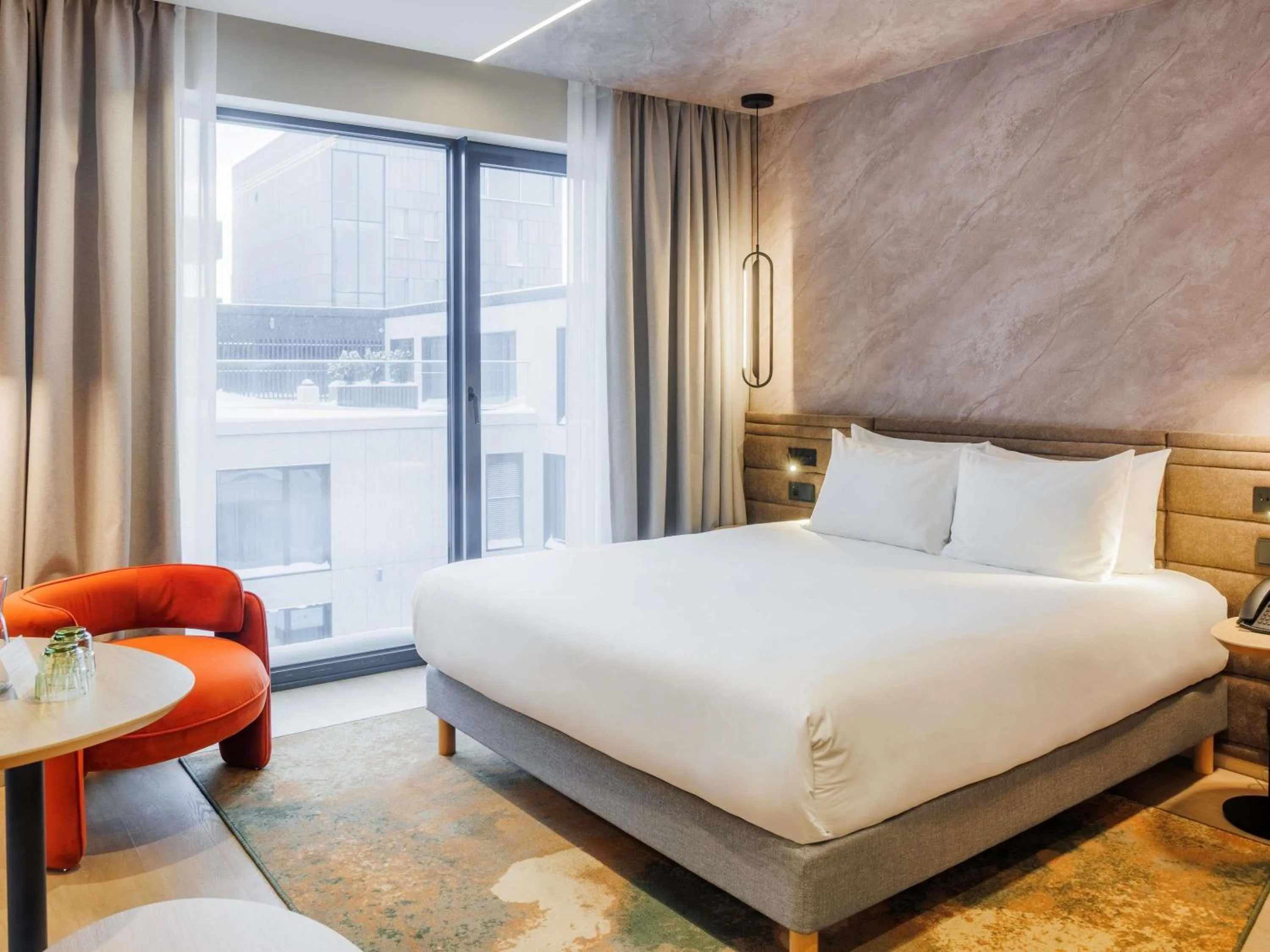 One-Bedroom Family Suite with King Bed, Sofa, Terrace and City View in Novotel Tallinn