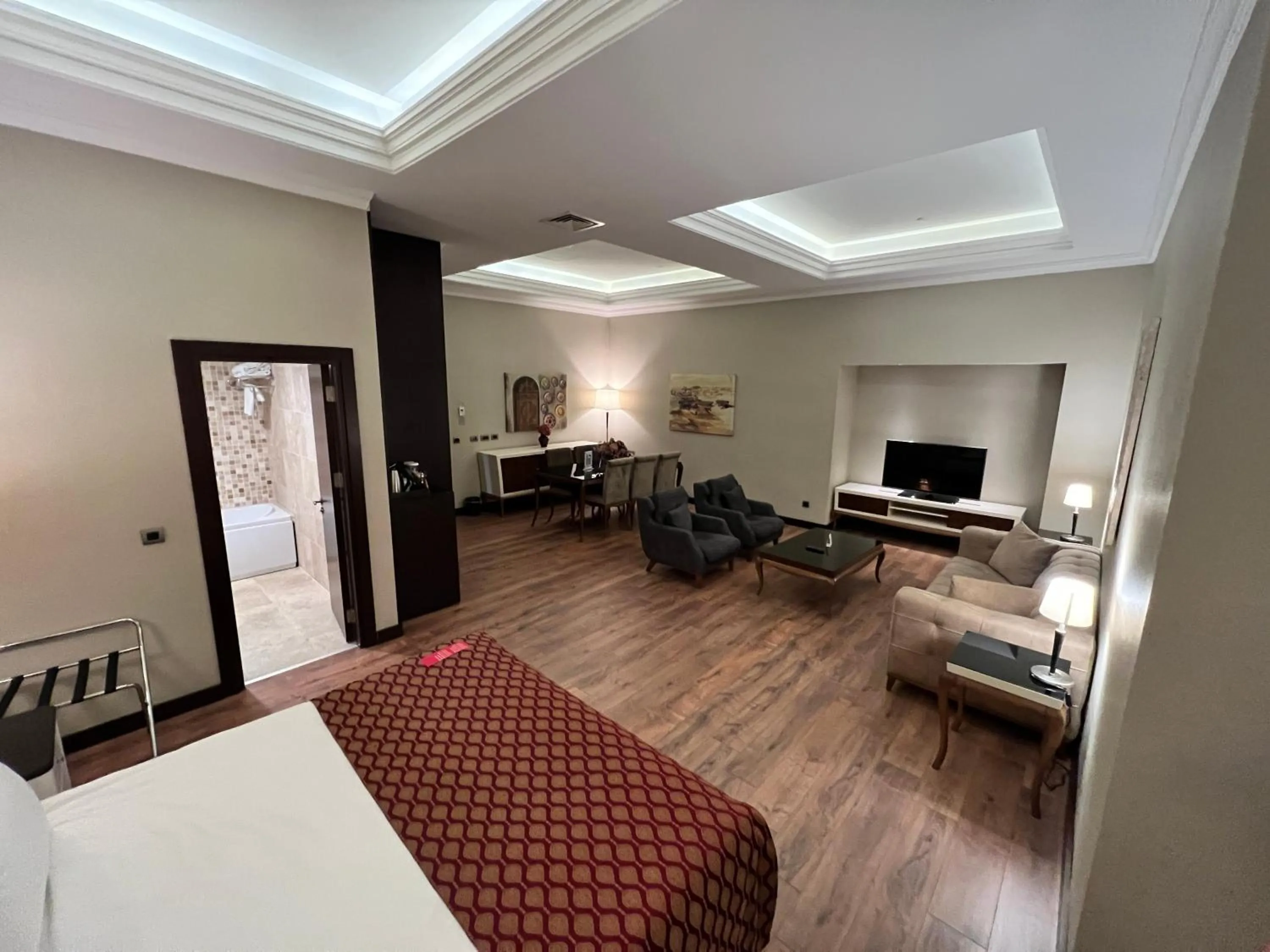 Communal lounge/ TV room, Bed in Ramada by Wyndham Istanbul Merter