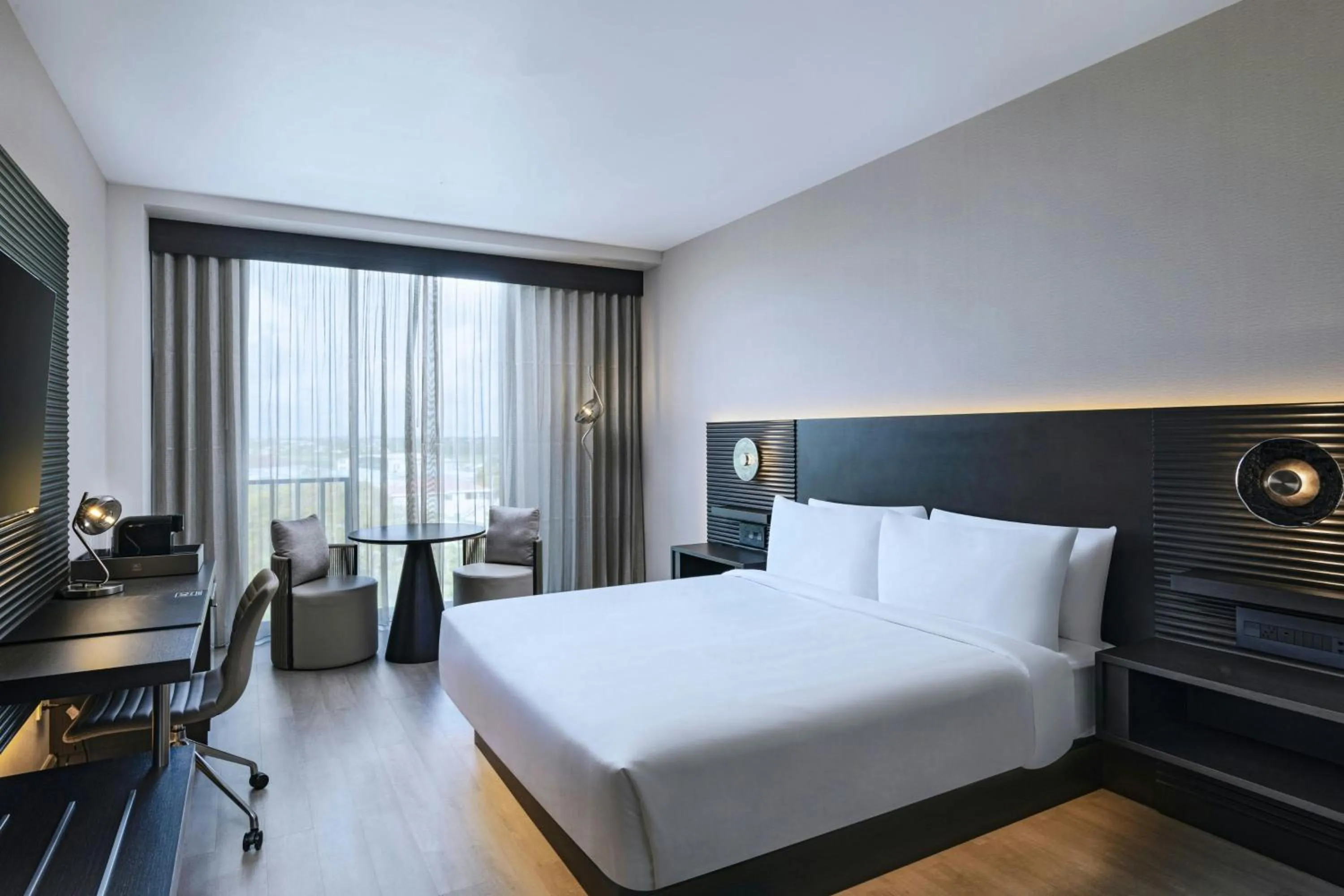 Photo of the whole room, Bed in AC Hotel by Marriott Georgetown Guyana