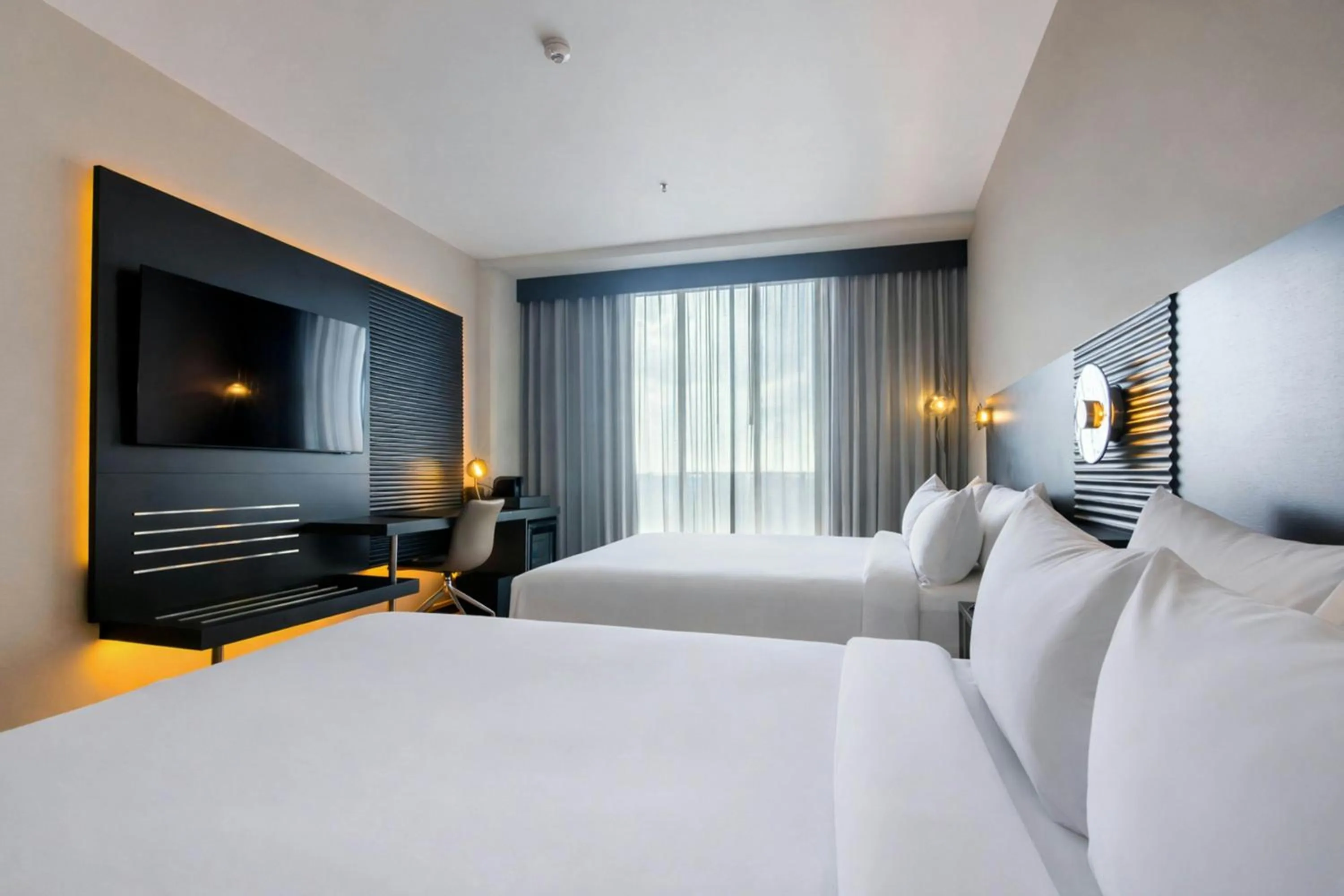 Photo of the whole room, Bed in AC Hotel by Marriott Georgetown Guyana