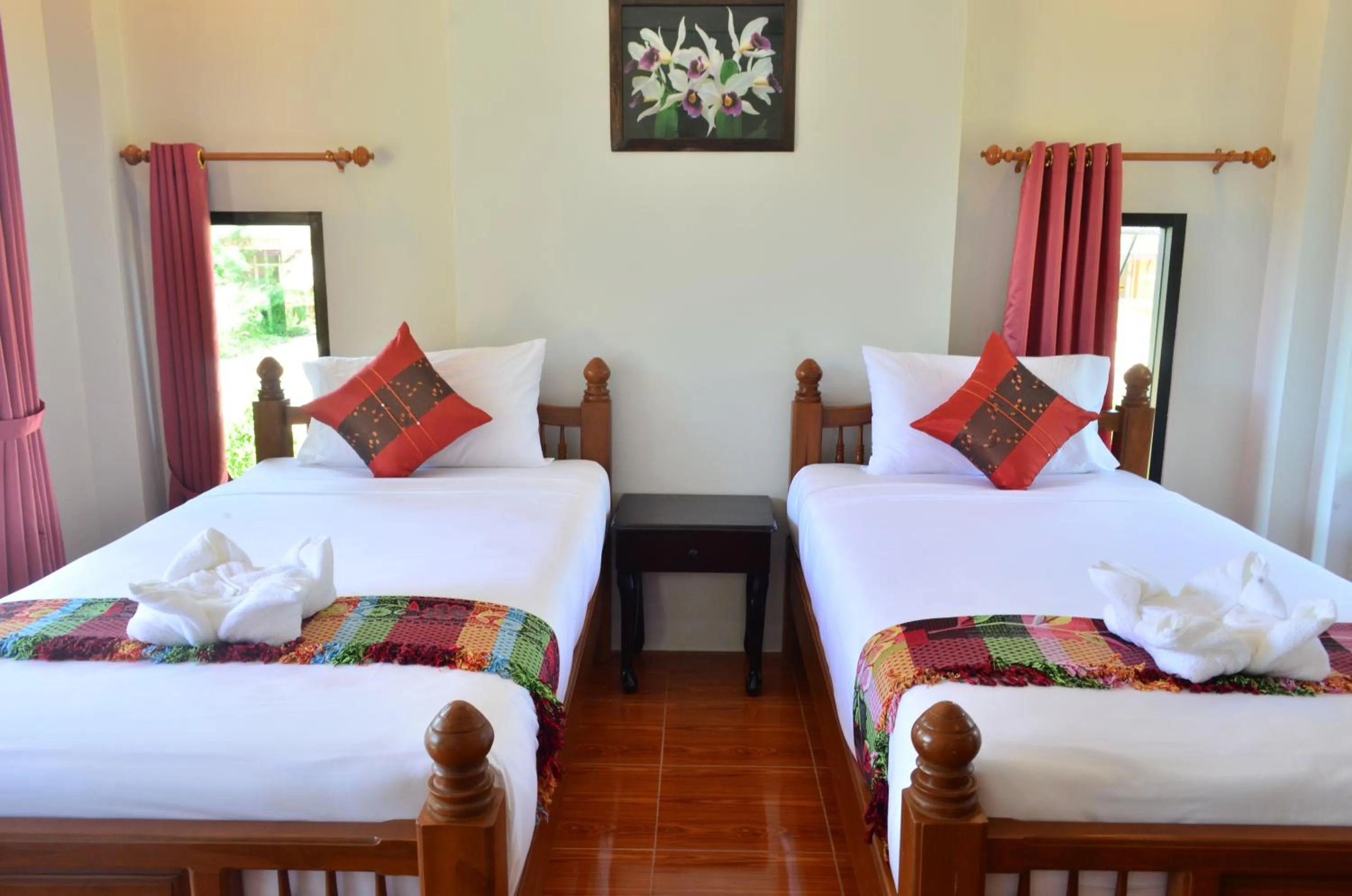 Bed in Phongphiphat Lanta Mansion