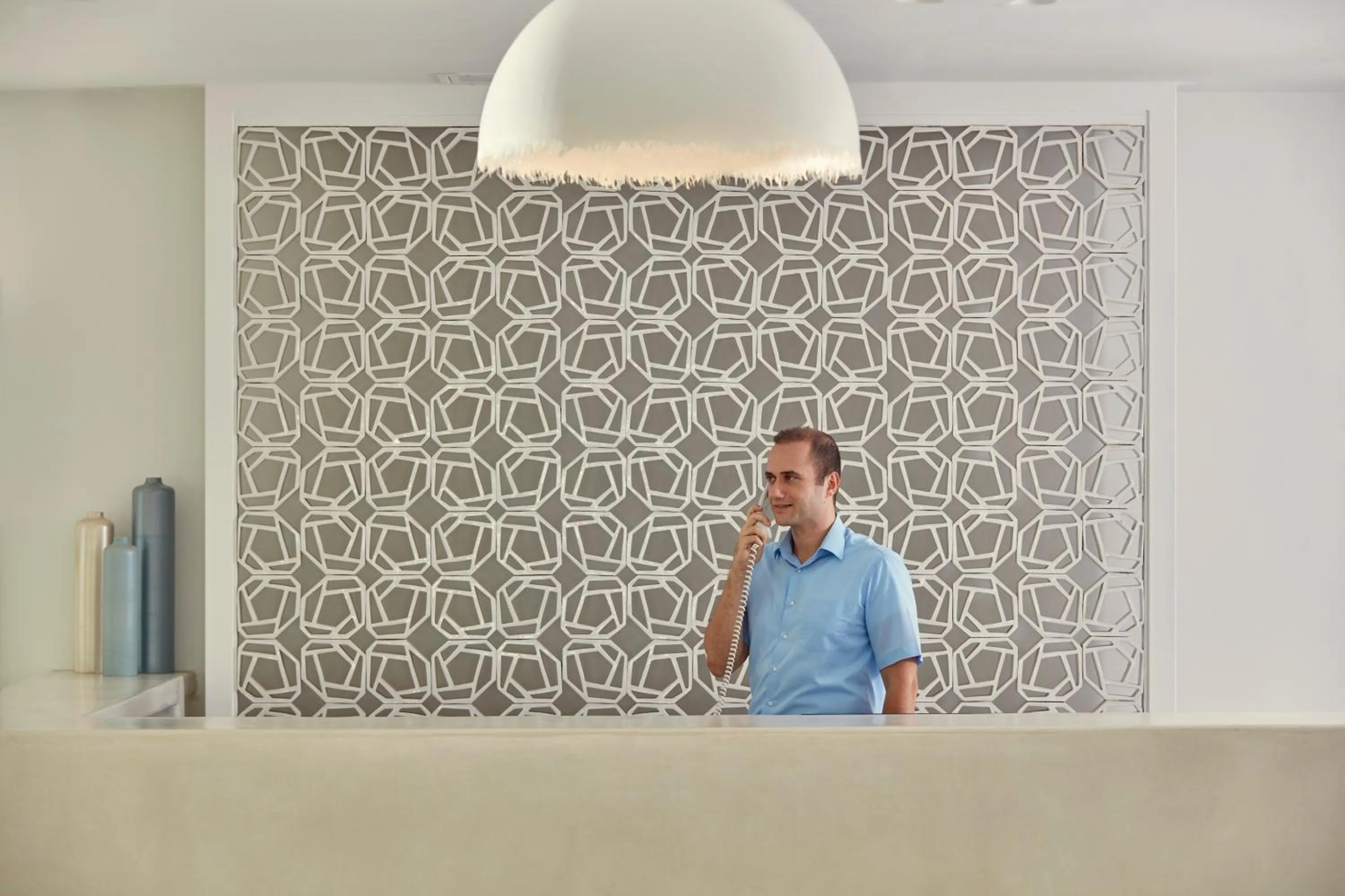 Lobby or reception in Aqua Blue Beach Hotel