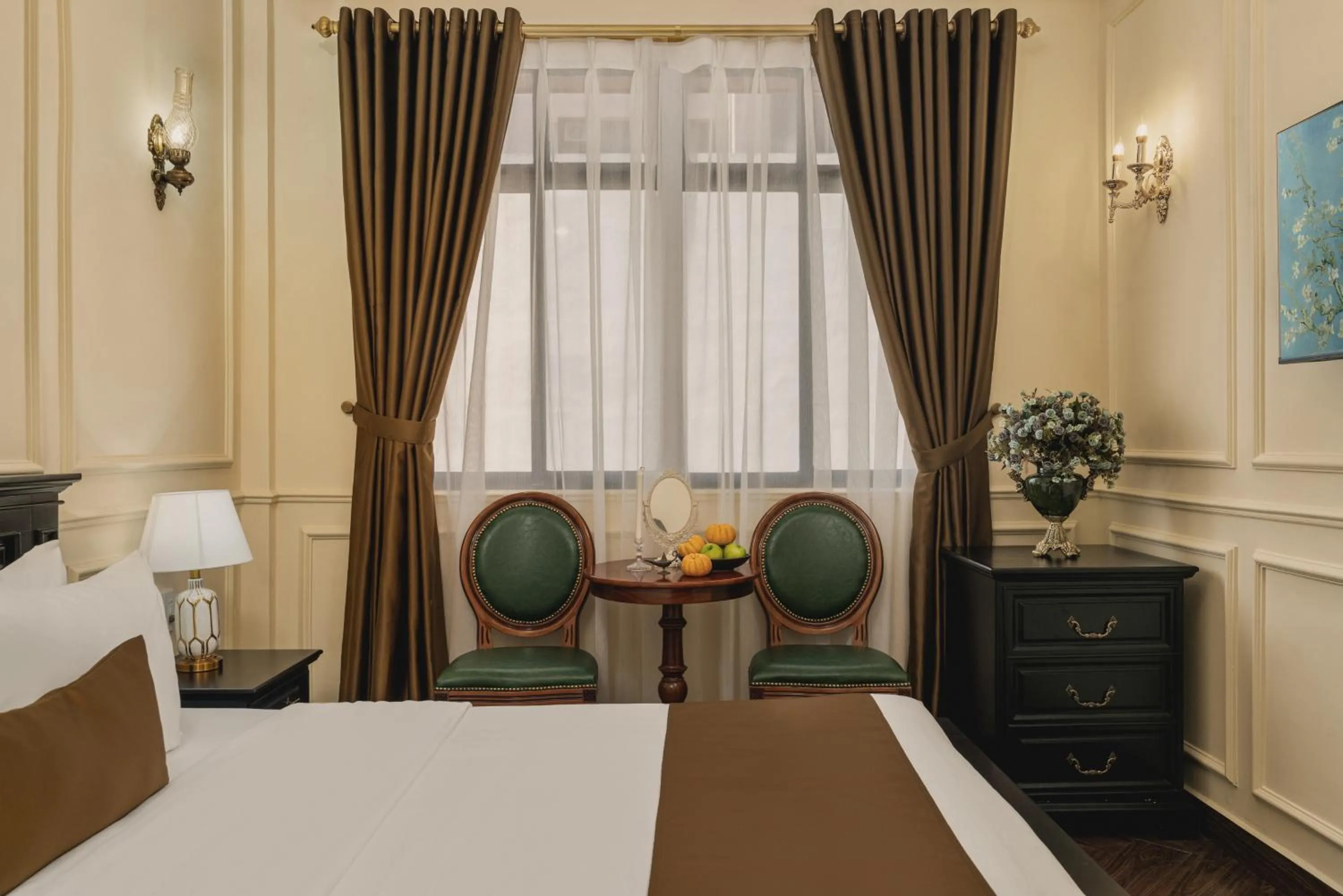 Bed in Vina Vintage Hotel