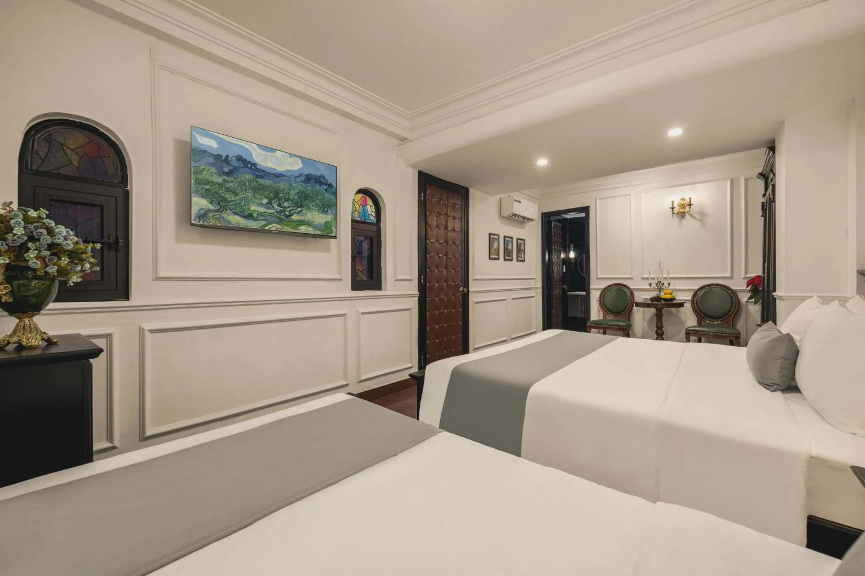 Bed in Vina Vintage Hotel