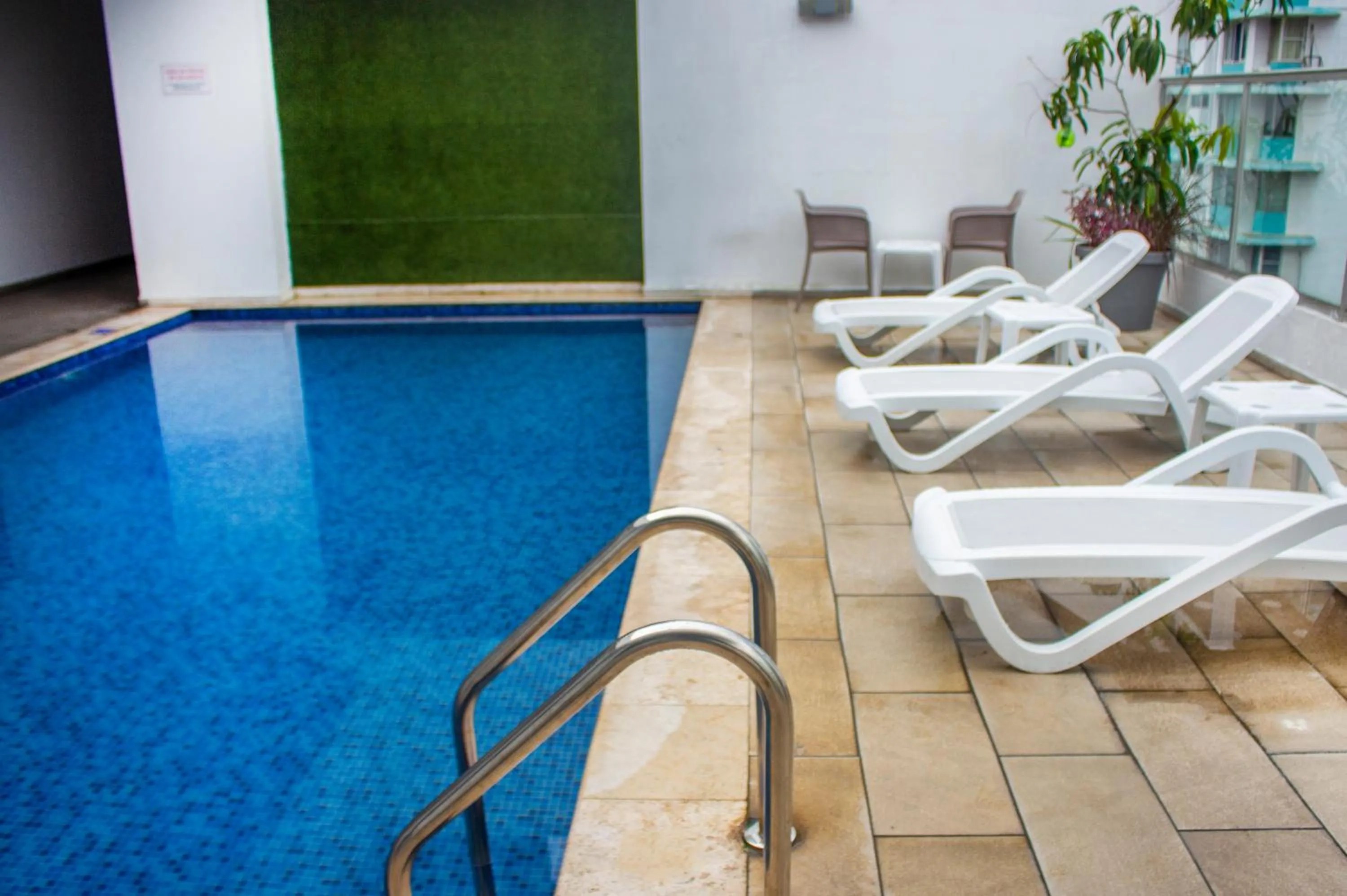 Swimming pool in Ramada by Wyndham Panama Via Argentina