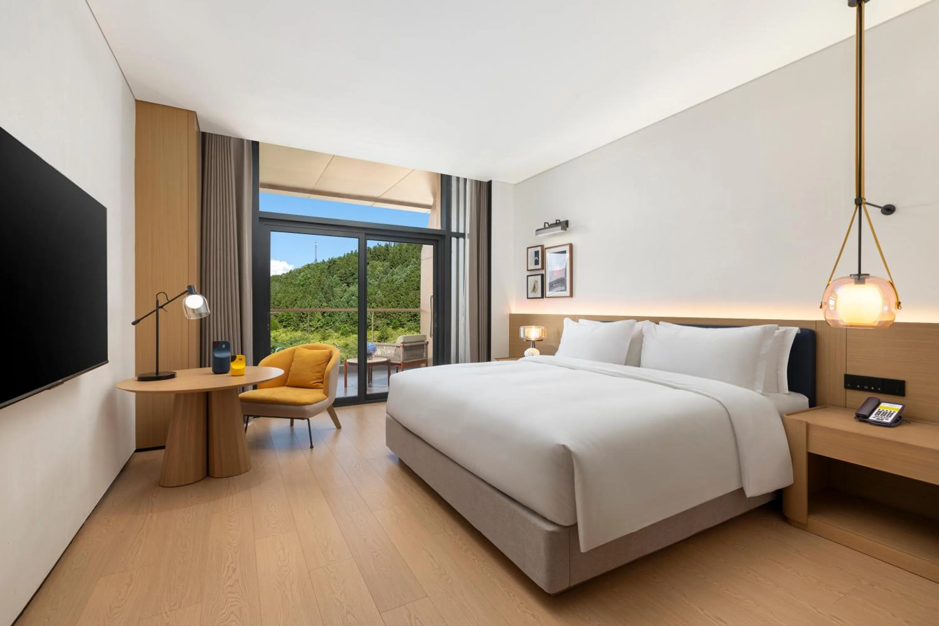 Standard King Room with Balcony in voco Wugong Mountain Jiangxi by IHG