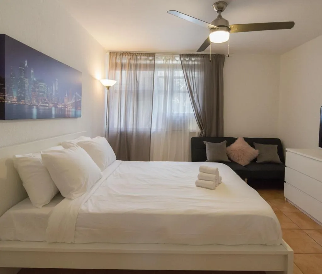 Bed in 713 Miami Beach Apartments