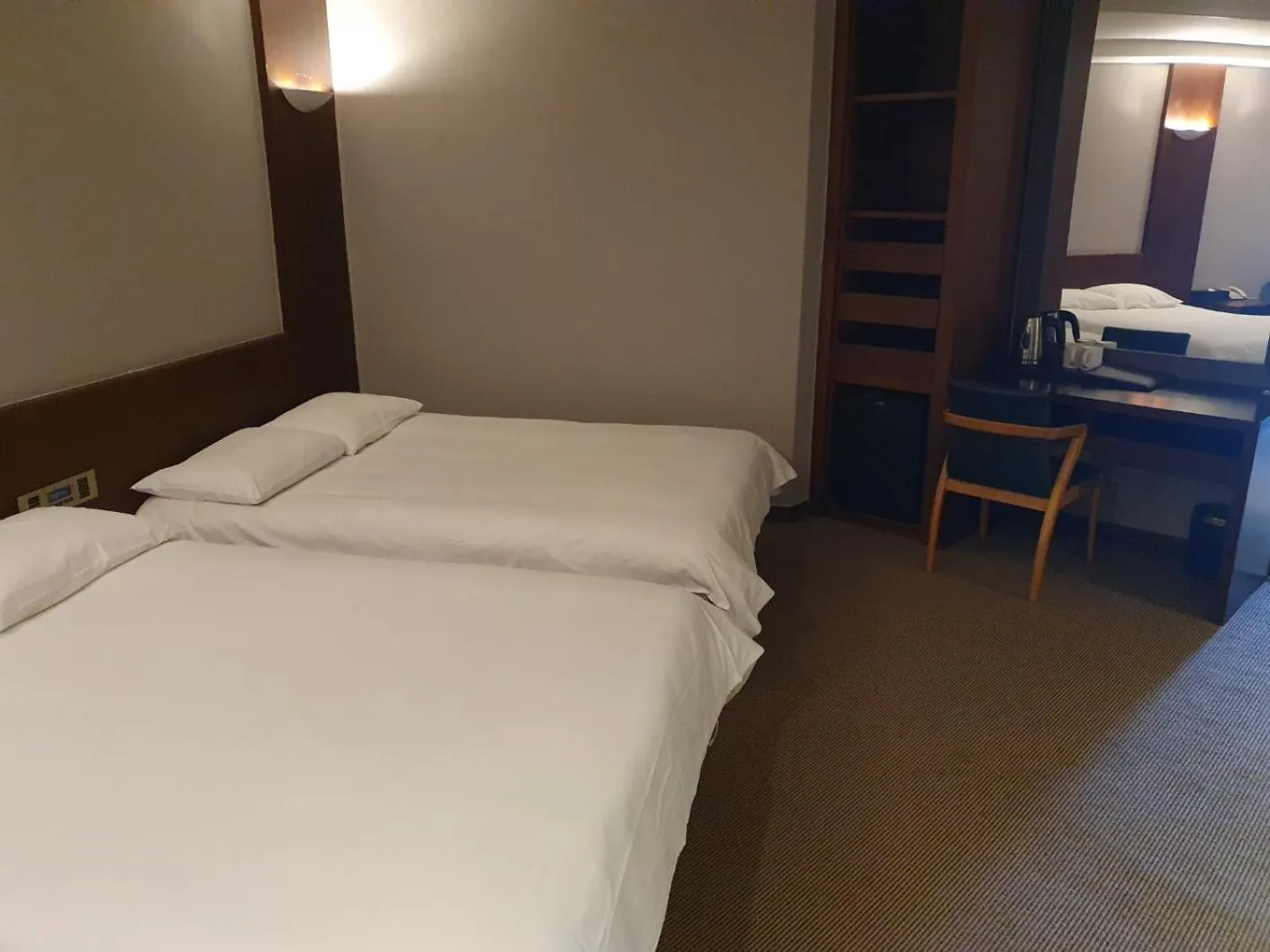Bed in Mstay Hotel