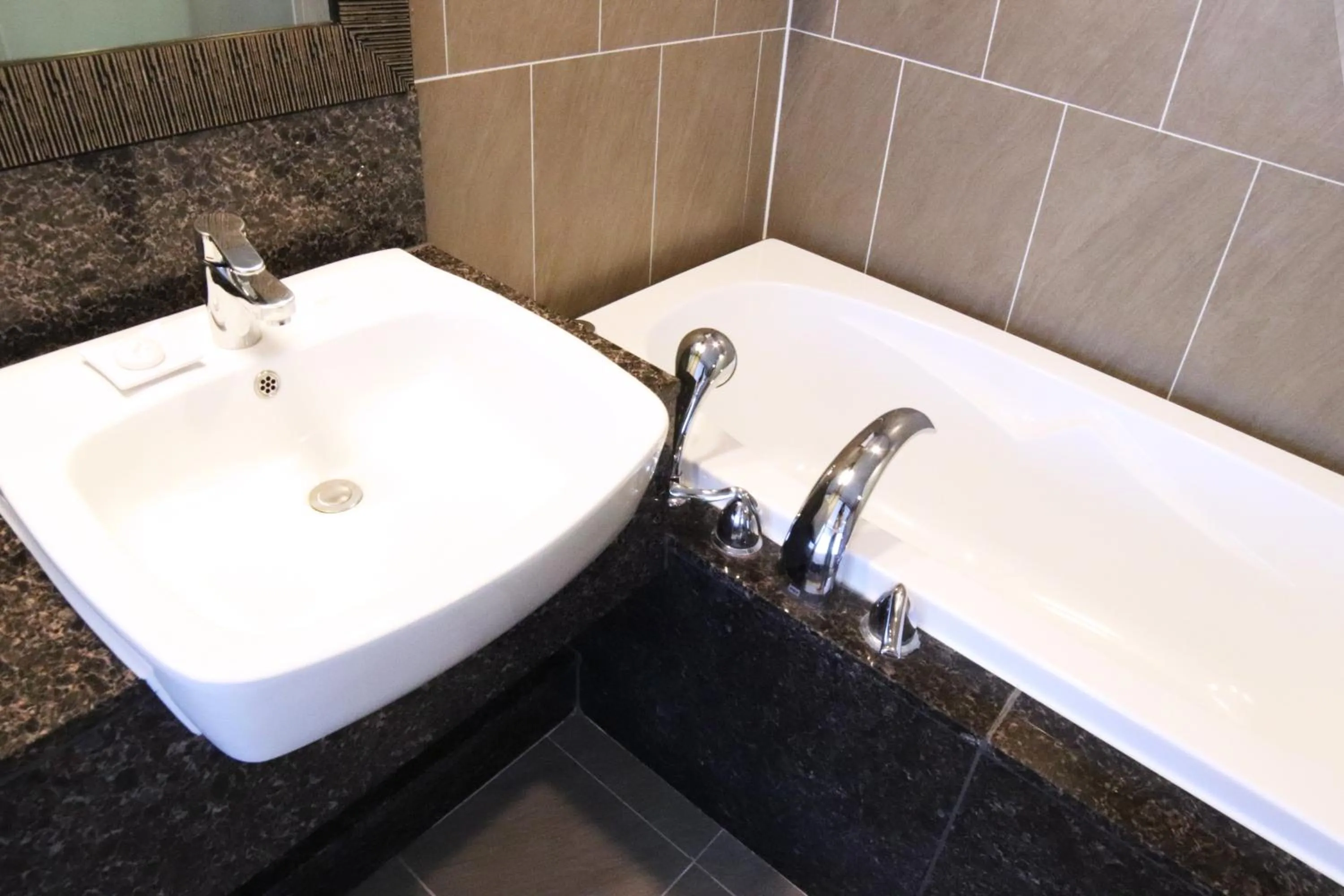 Bathroom in Mstay Hotel